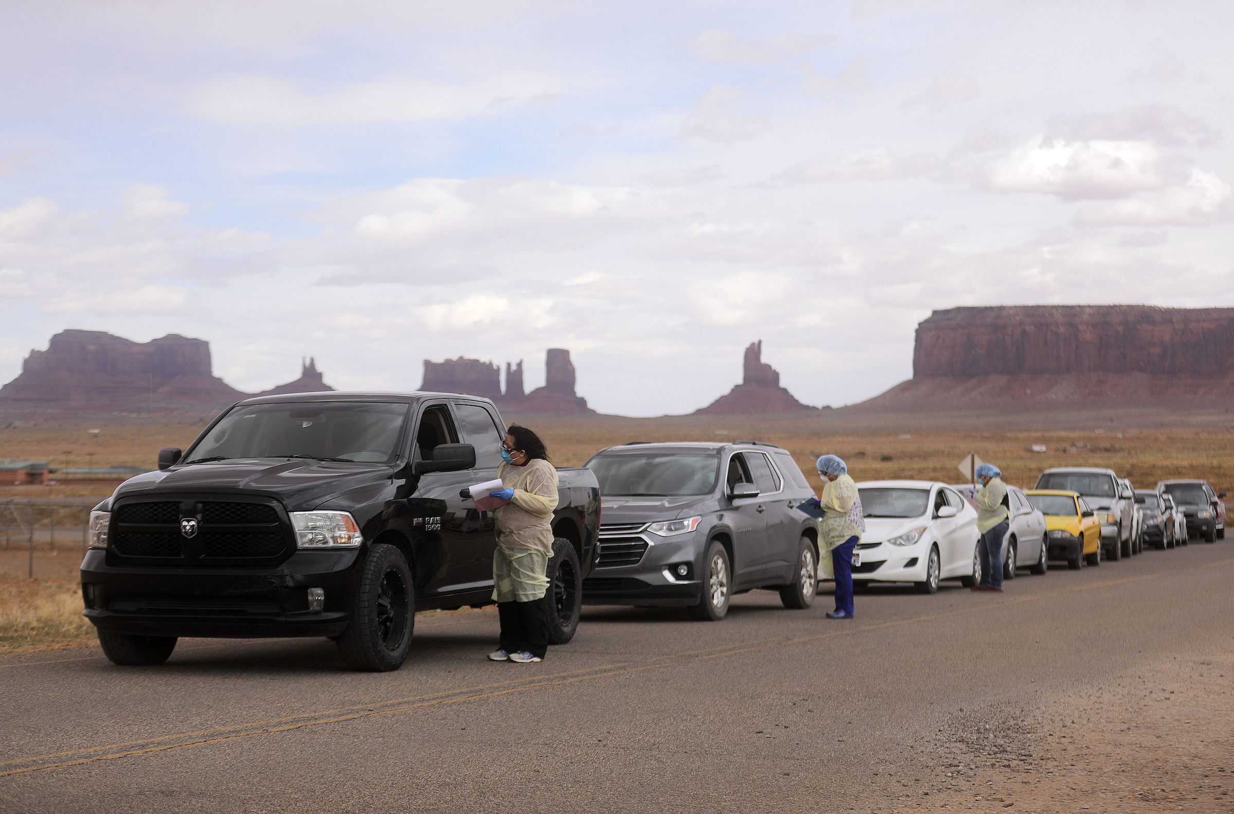 people lined up to get tested for COVID-19 outside of the health center in Oljato-Monument Valley, Utah, on April 16, 2020.