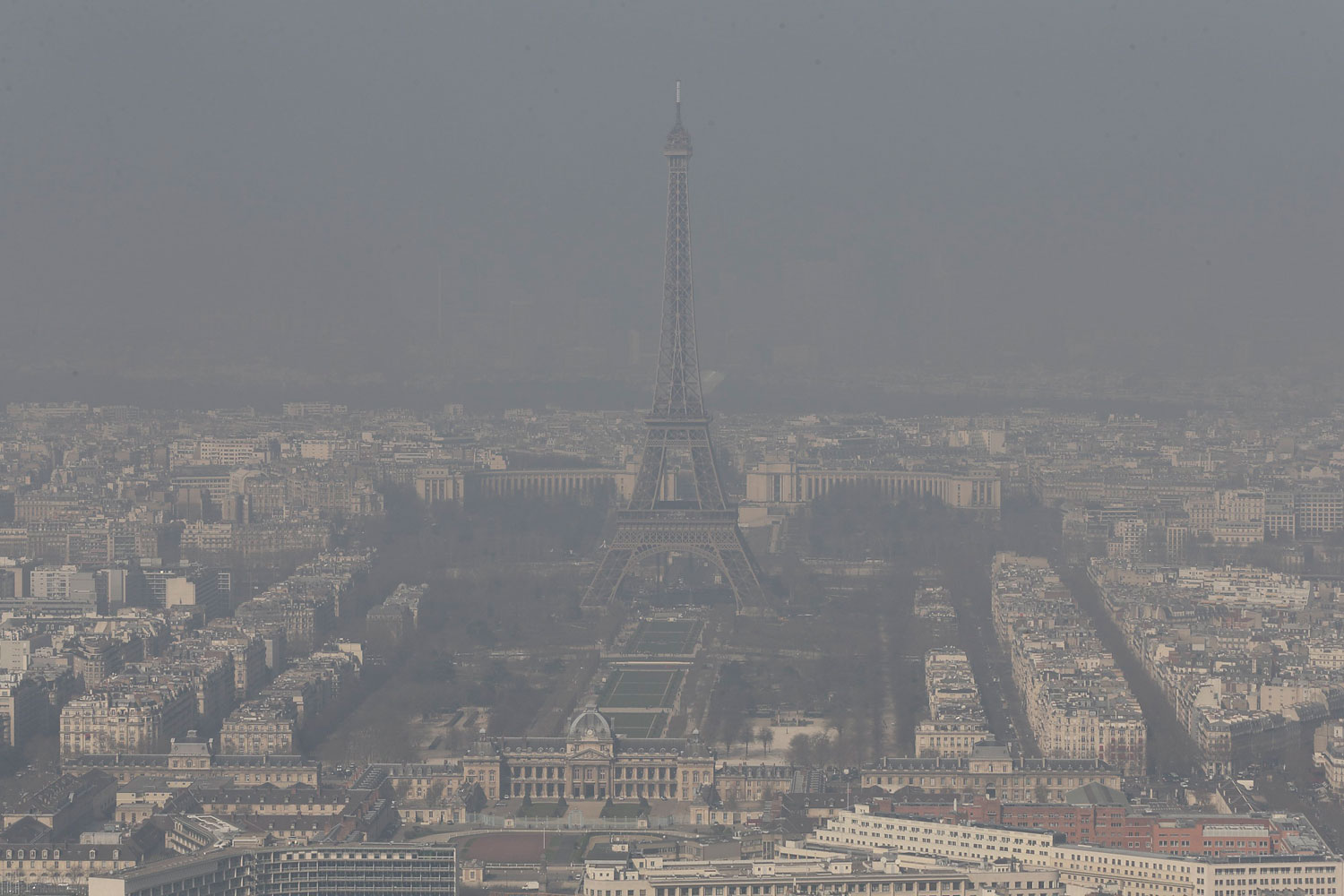 A general view shows the Eiffel tower and the Paris skyline through a small-particle haze March 13, 2014.