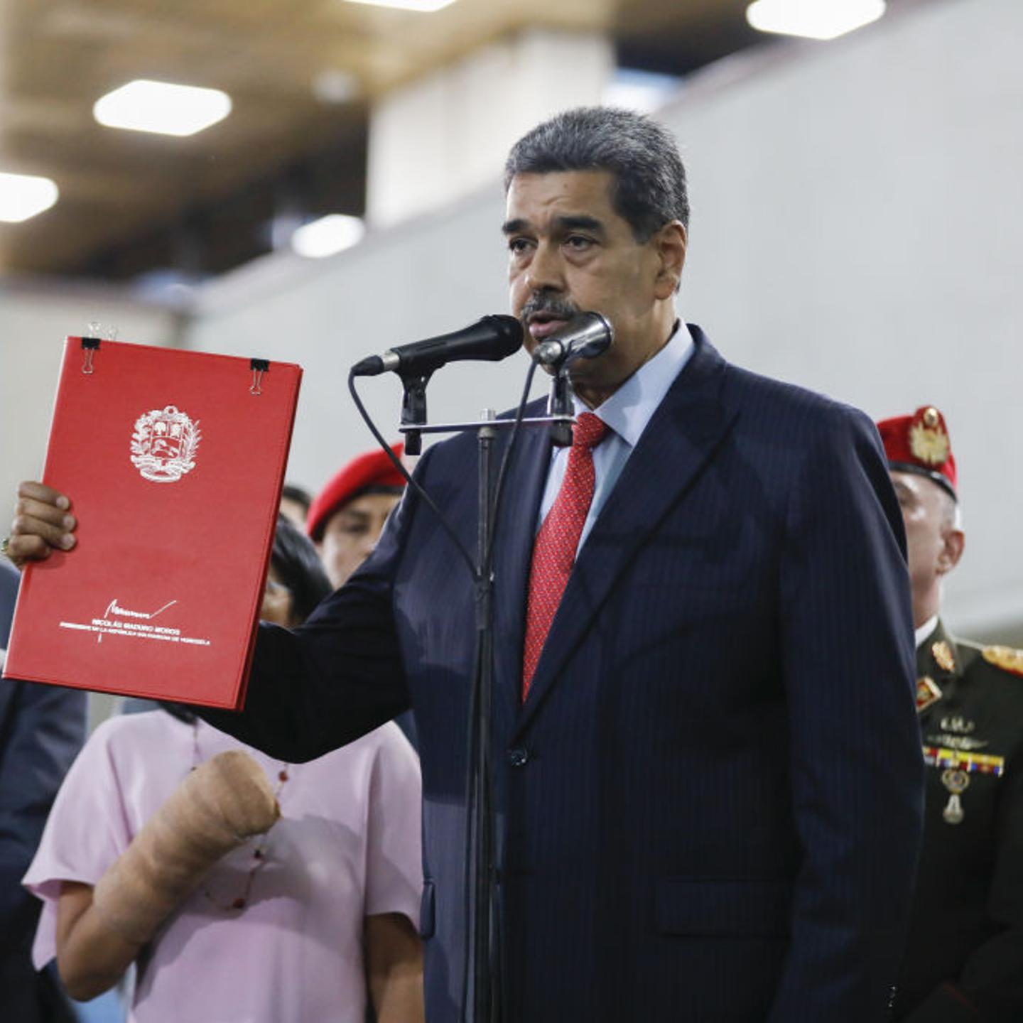 Venezuelan President Nicolás Maduro shows the Venezuelan Supreme Court the documents he asked it to supervise the presidential elections following the Sunday's presidential elections in Caracas, Venezuela on July 31, 2024.