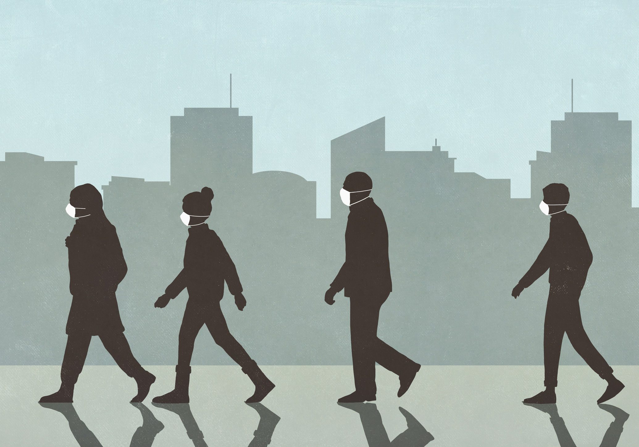 Pedestrians in masks walking in city