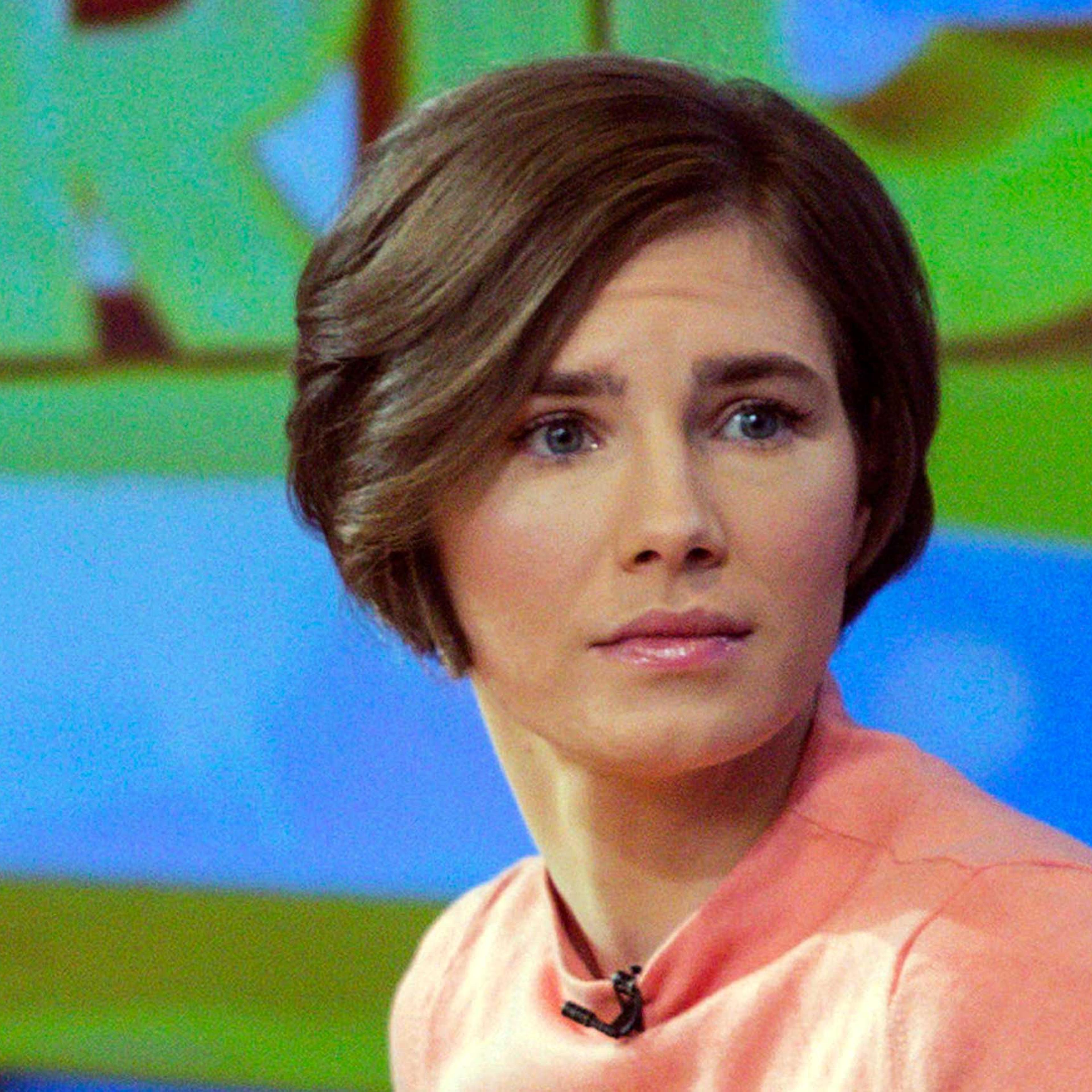 Amanda Knox reacts while being interviewed on the set of ABC's "Good Morning America" in New York in this January 31, 2014 file photo.