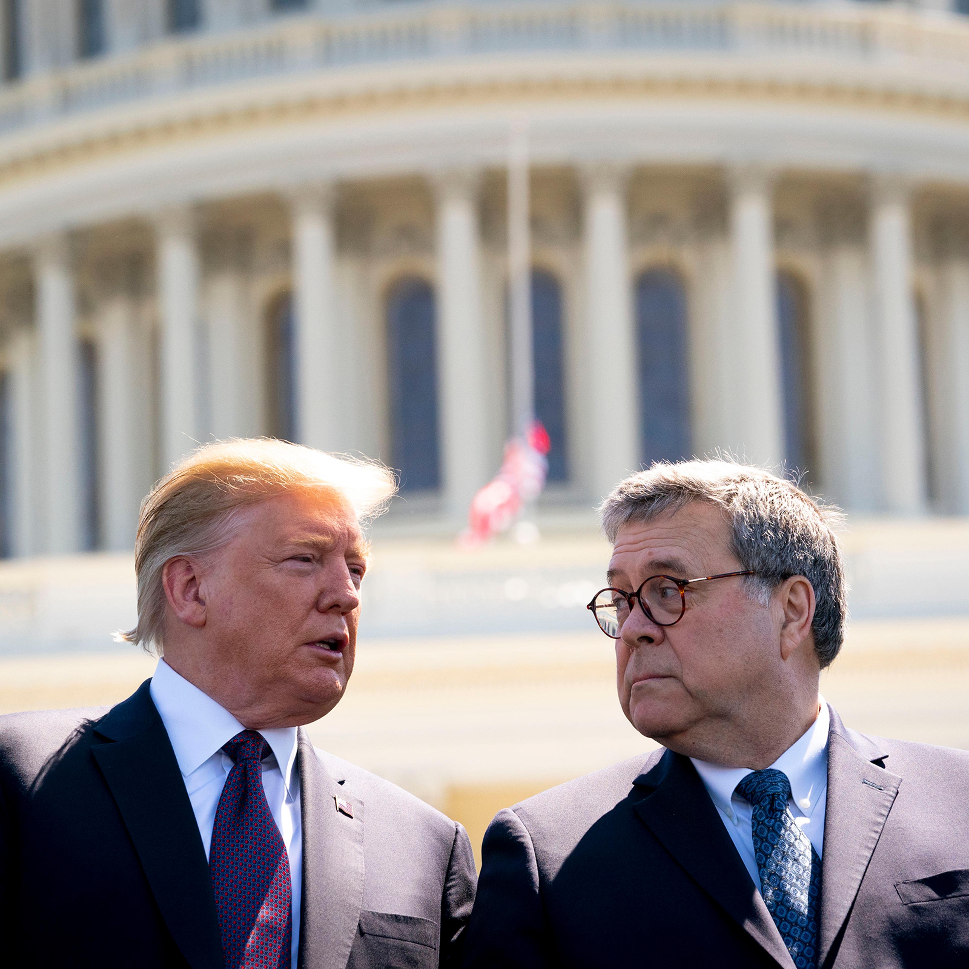 President Donald Trump and Attorney General William Barr talk while attending the 38th Annual National Peace Officers Memorial Service on Capitol Hill.