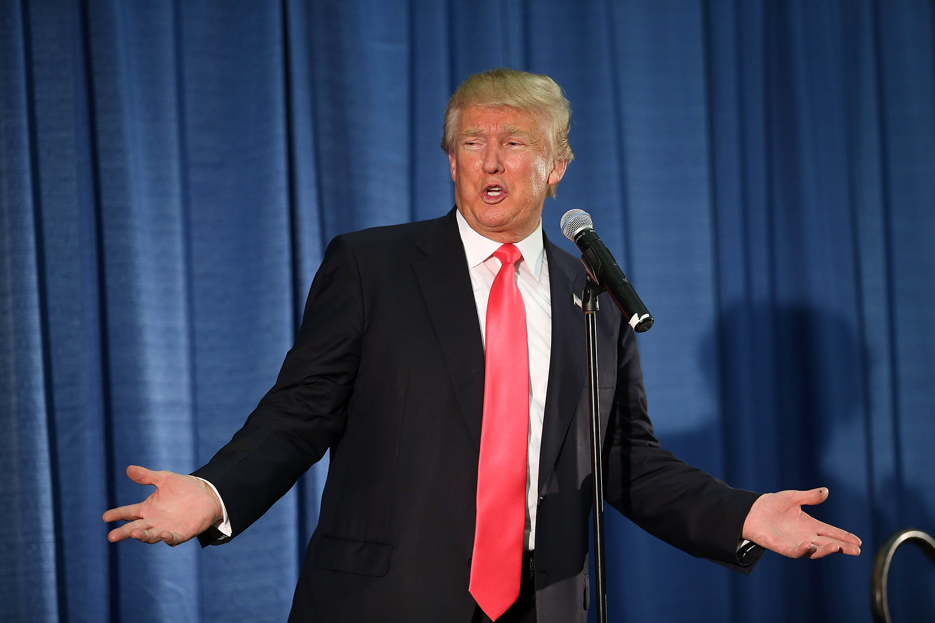 MILFORD, NH - FEBRUARY 02:  Republican Presidential candidate Donald Trump speaks to an overflow crowd during a campaign event at Hampshire Hills Athletic Club on February 2, 2016 in Milford, Iowa. Democratic and Republican Presidential are stumping for 