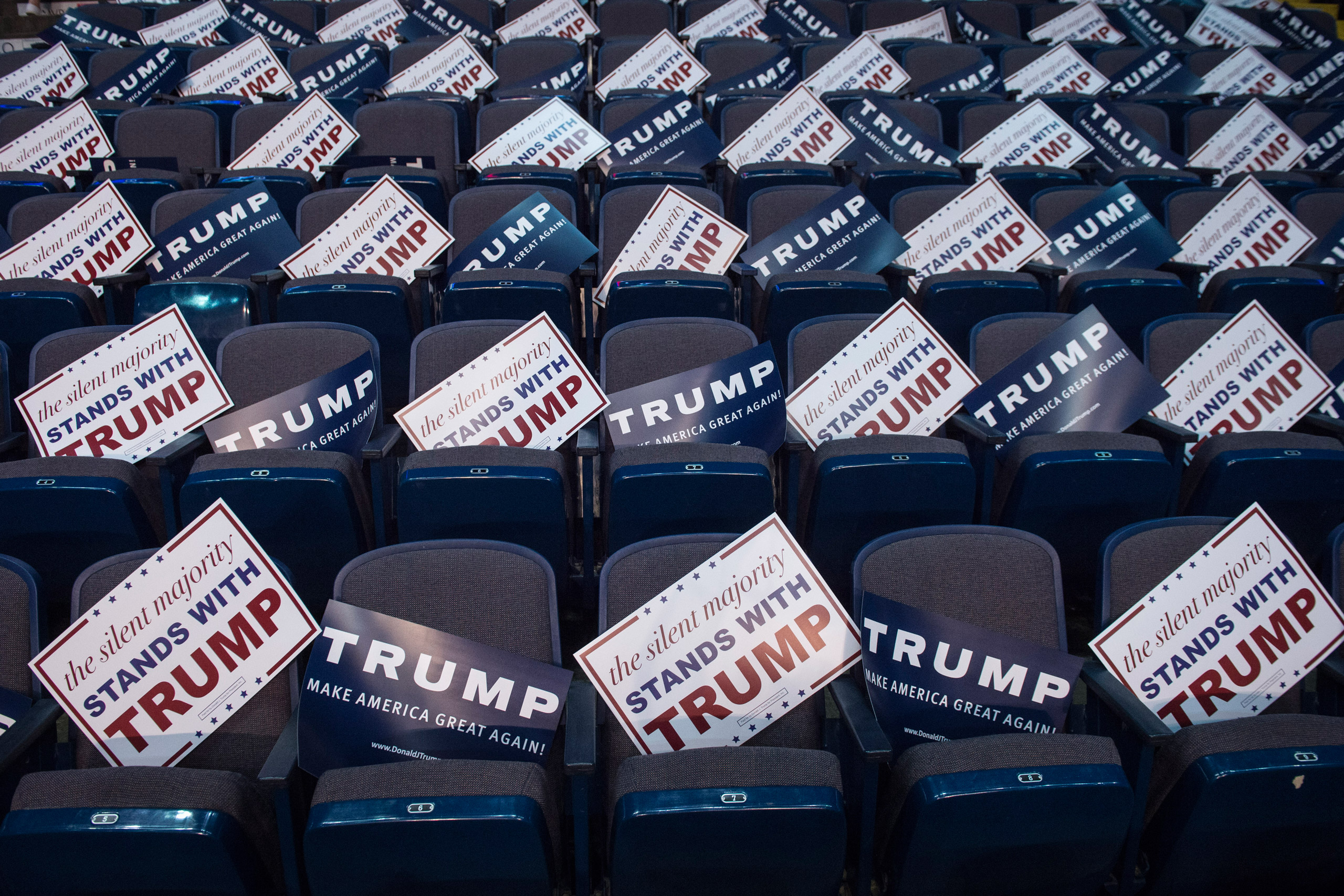 ALBANY, NY - APRIL 11: Signs are seen in empty seats before republican presidential candidate Donald Trump speaks during a campaign event at the Times Union Center in Albany, NY on Monday April 11, 2016. (Photo by Jabin Botsford/The Washington Post via G