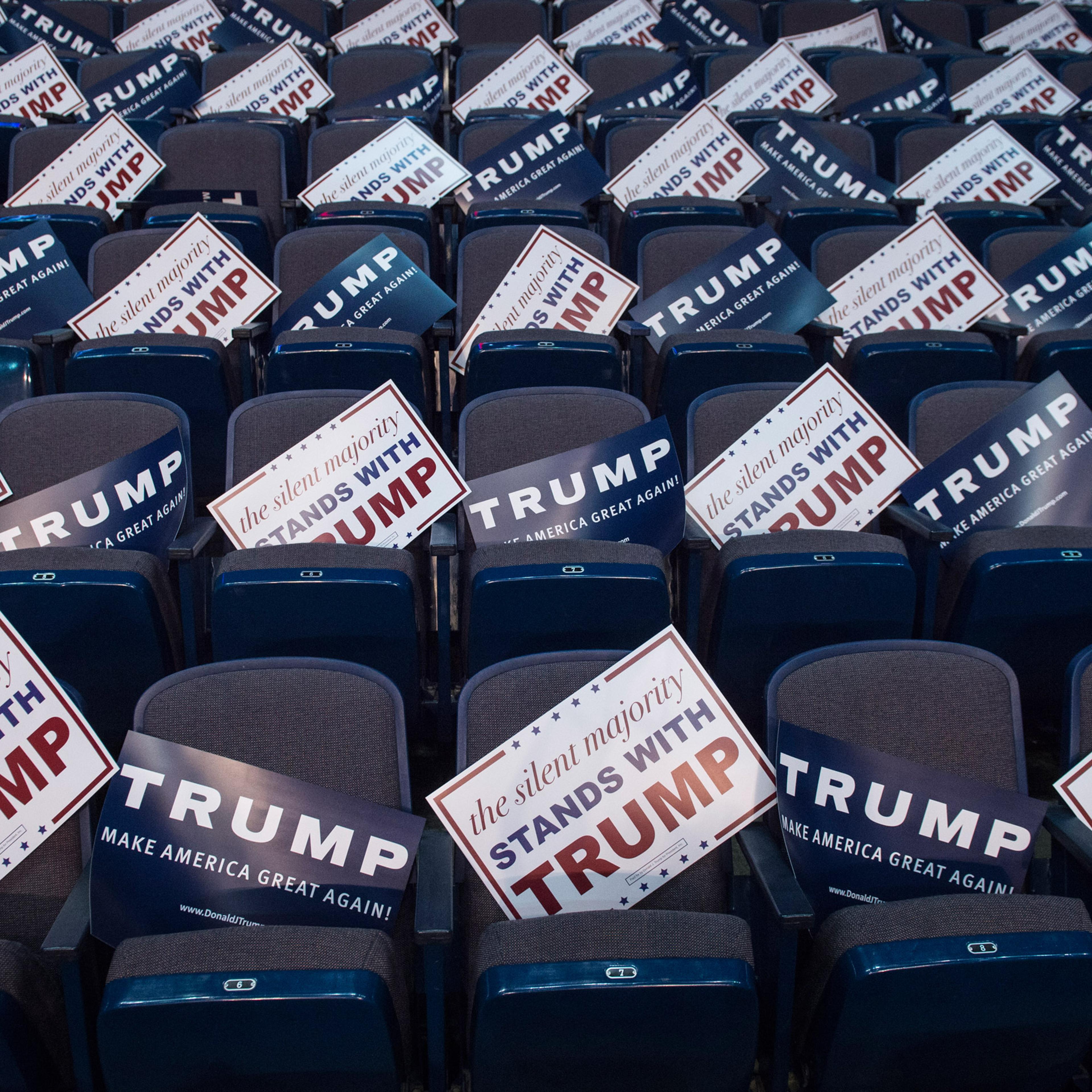 ALBANY, NY - APRIL 11: Signs are seen in empty seats before republican presidential candidate Donald Trump speaks during a campaign event at the Times Union Center in Albany, NY on Monday April 11, 2016. (Photo by Jabin Botsford/The Washington Post via G