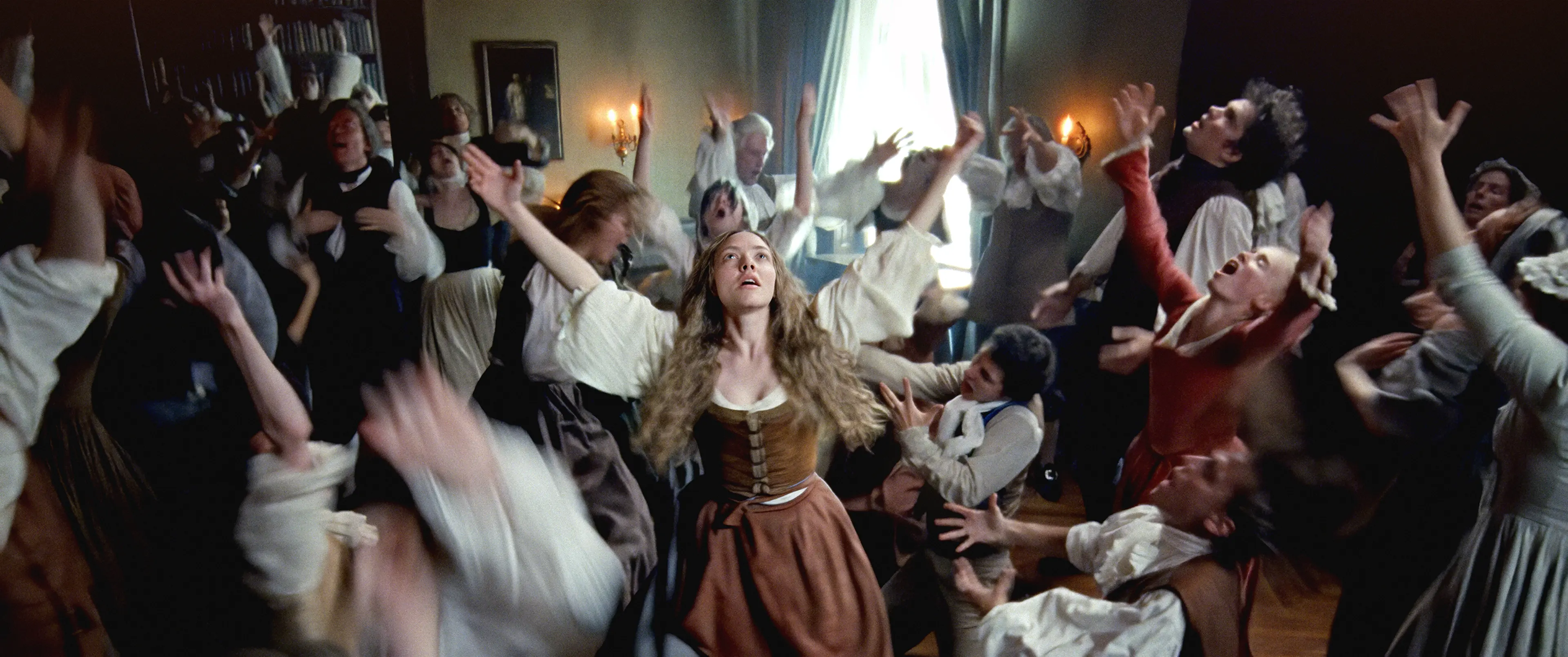 Amanda Seyfried and ensemble in THE TESTAMENT OF ANN LEE. Photo by Searchlight Pictures/William Rexer, Courtesy of Searchlight Pictures. © 2025 Searchlight Pictures. All Rights Reserved.