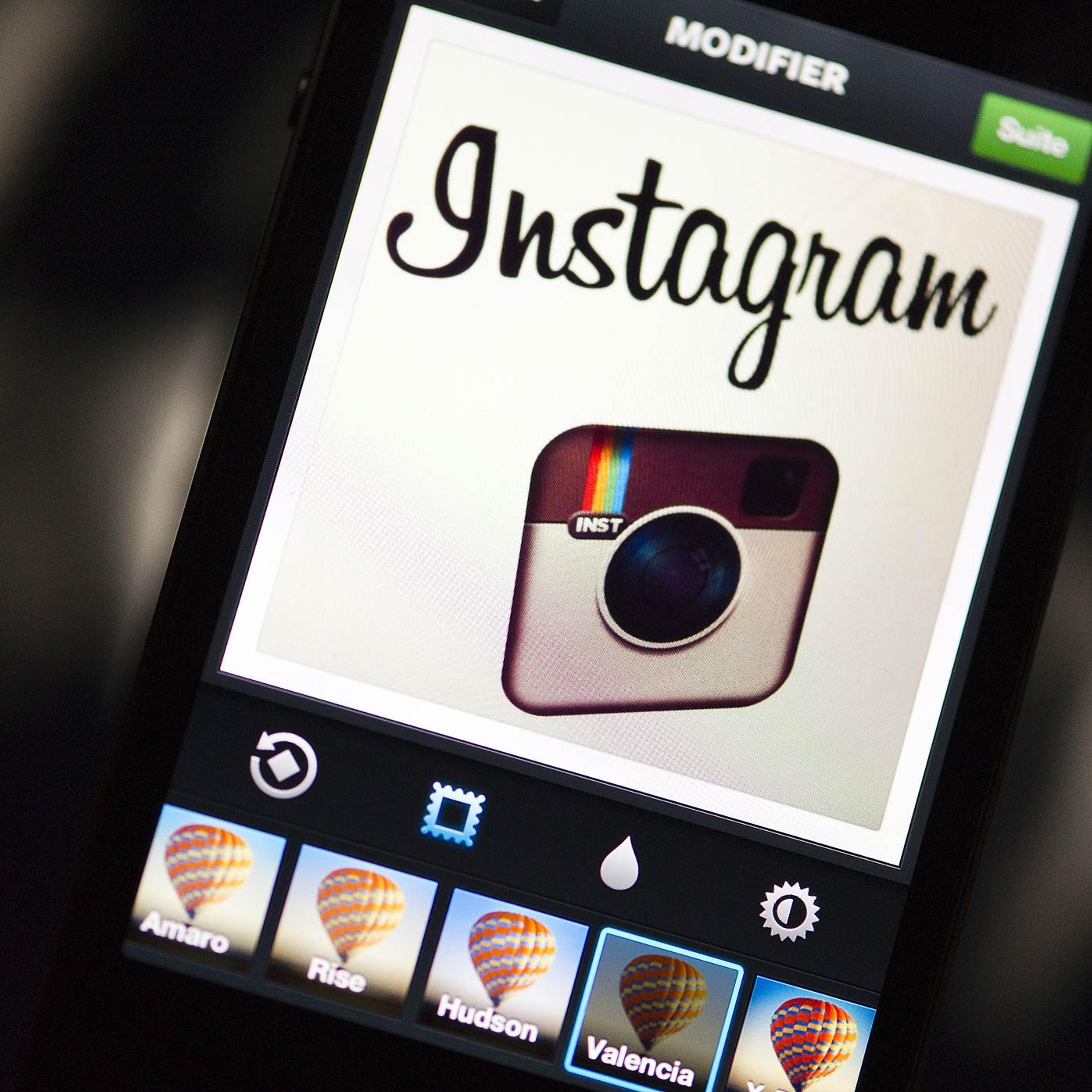 The Instagram logo is displayed on a smartphone on Dec. 20, 2012 in Paris, France.