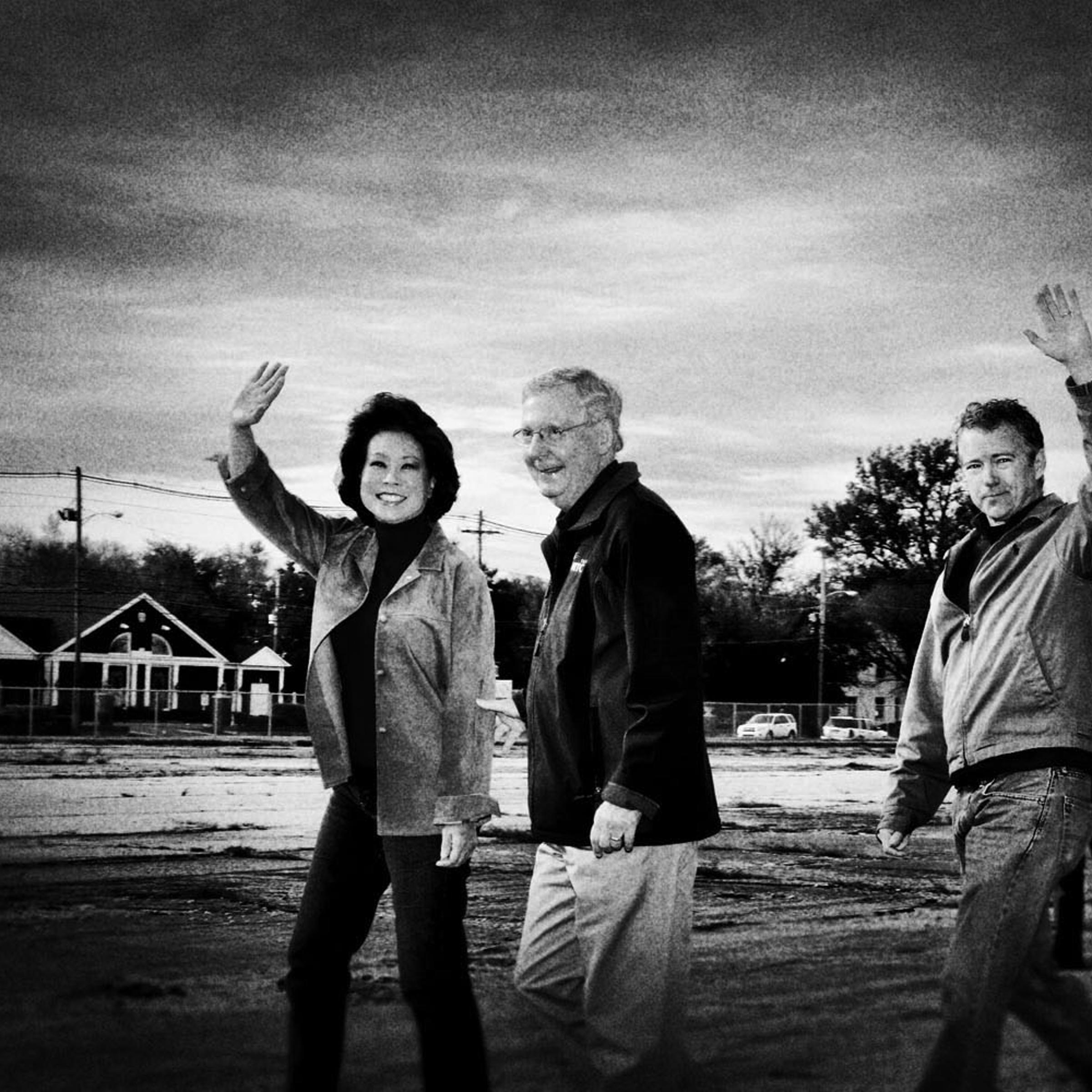 Senator Mitch McConnell with his wife, former Secretary of Labor Elaine Chao and Sen. Rand Paul, in Louisville, Ky., Nov. 3, 2014.