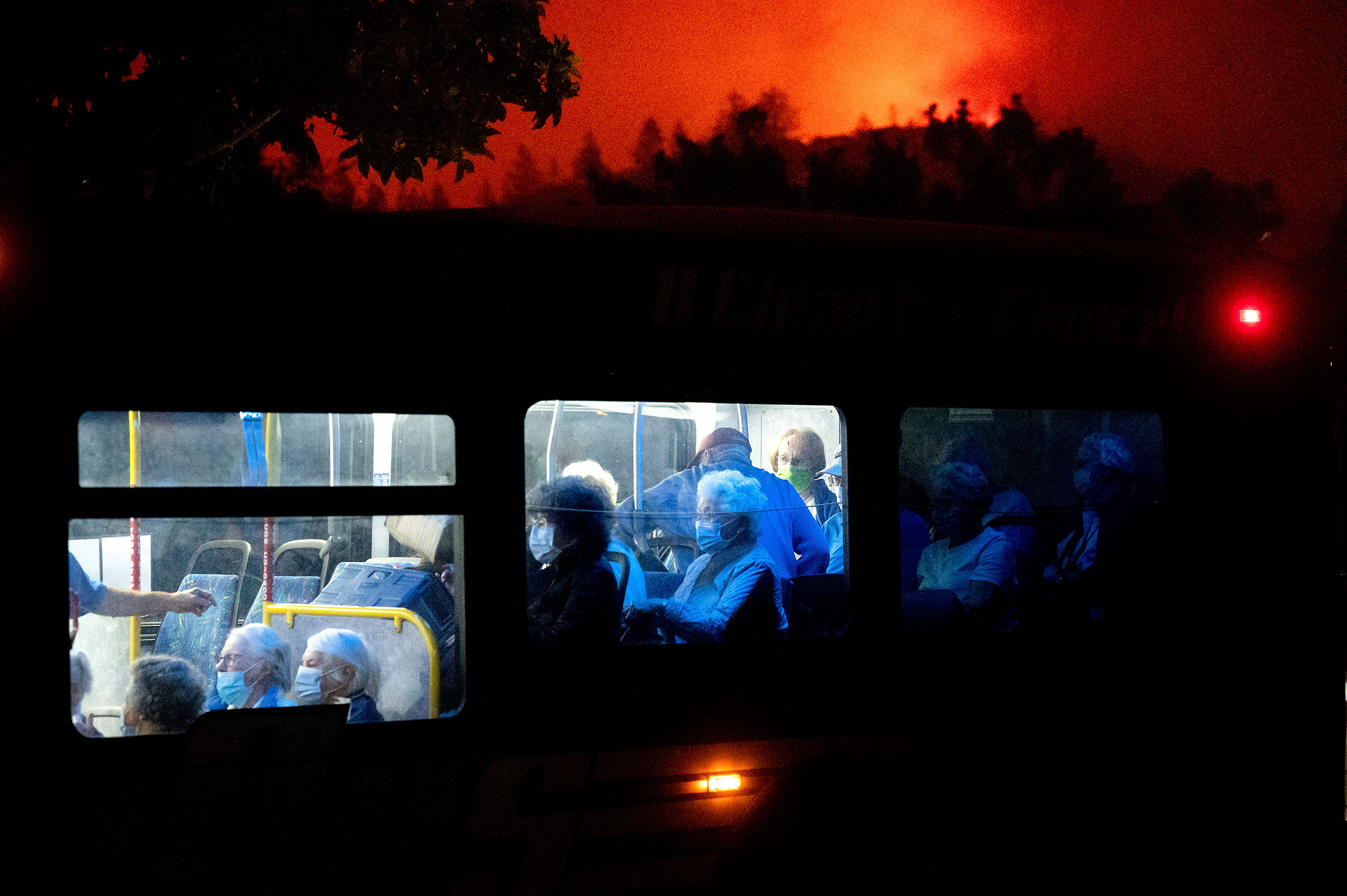 Residents of the Oakmont Gardens senior home evacuate on a bus as the Shady Fire approaches in Santa Rosa Calif., on Sept. 28, 2020.