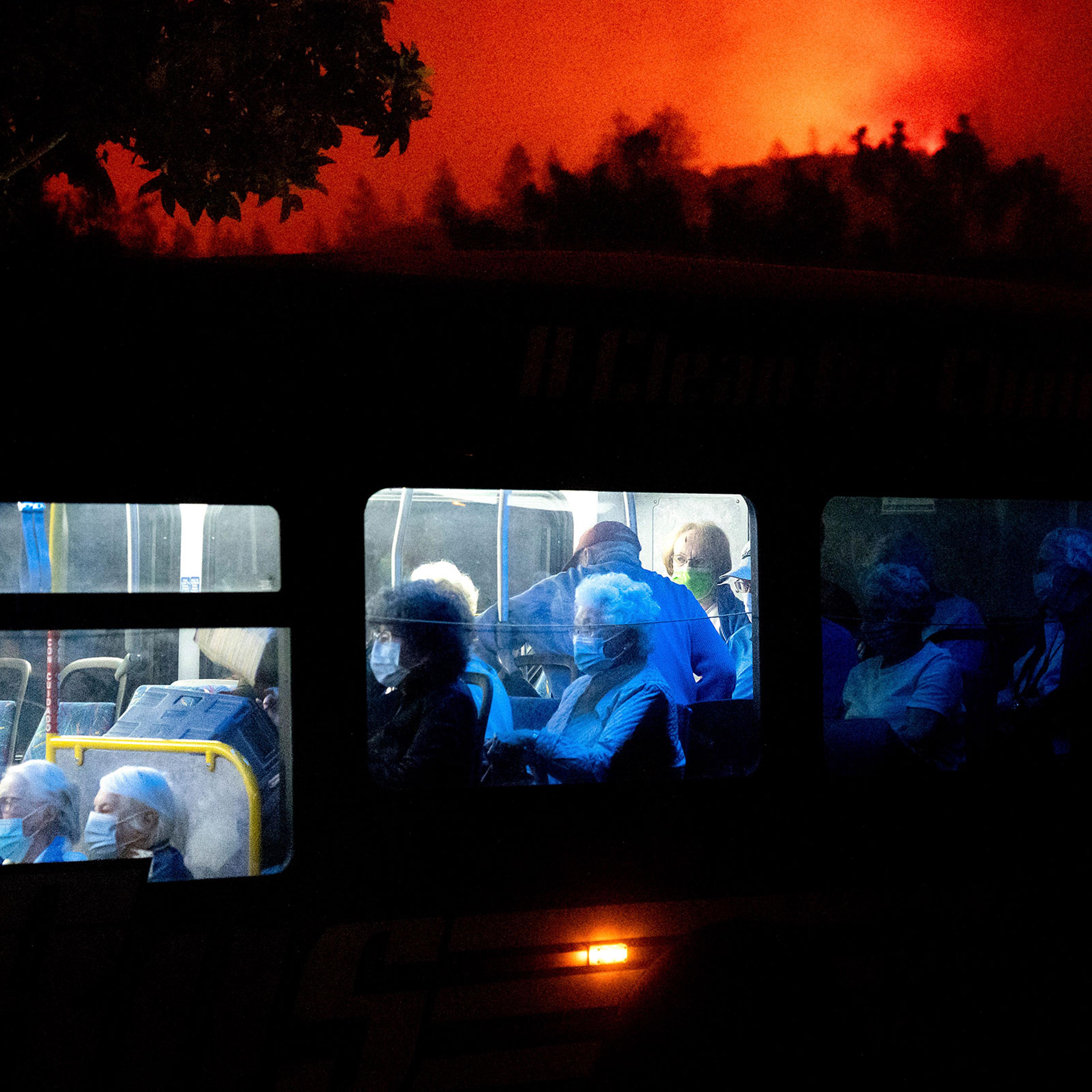 Residents of the Oakmont Gardens senior home evacuate on a bus as the Shady Fire approaches in Santa Rosa Calif., on Sept. 28, 2020.