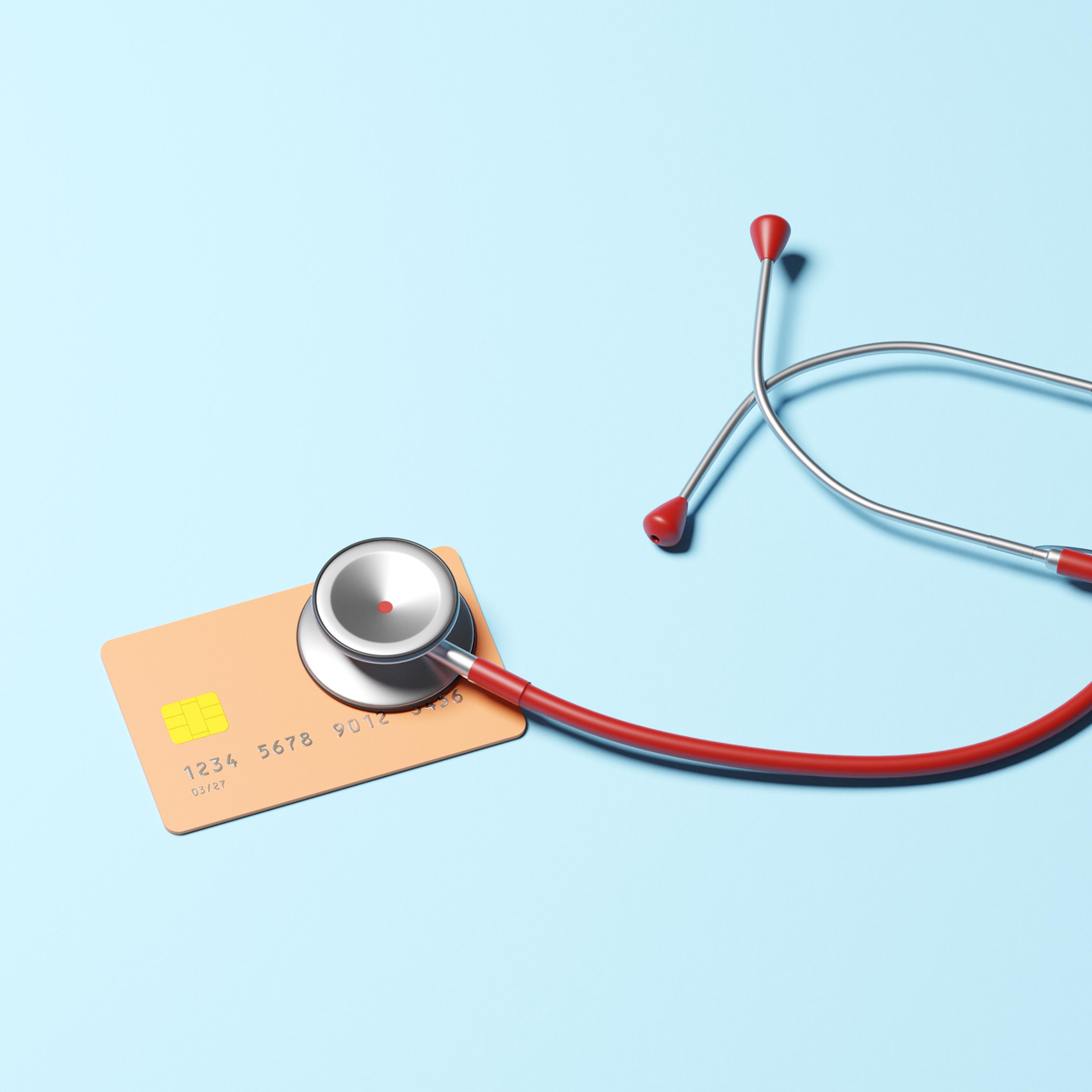 Stethoscope checking health of Credit card