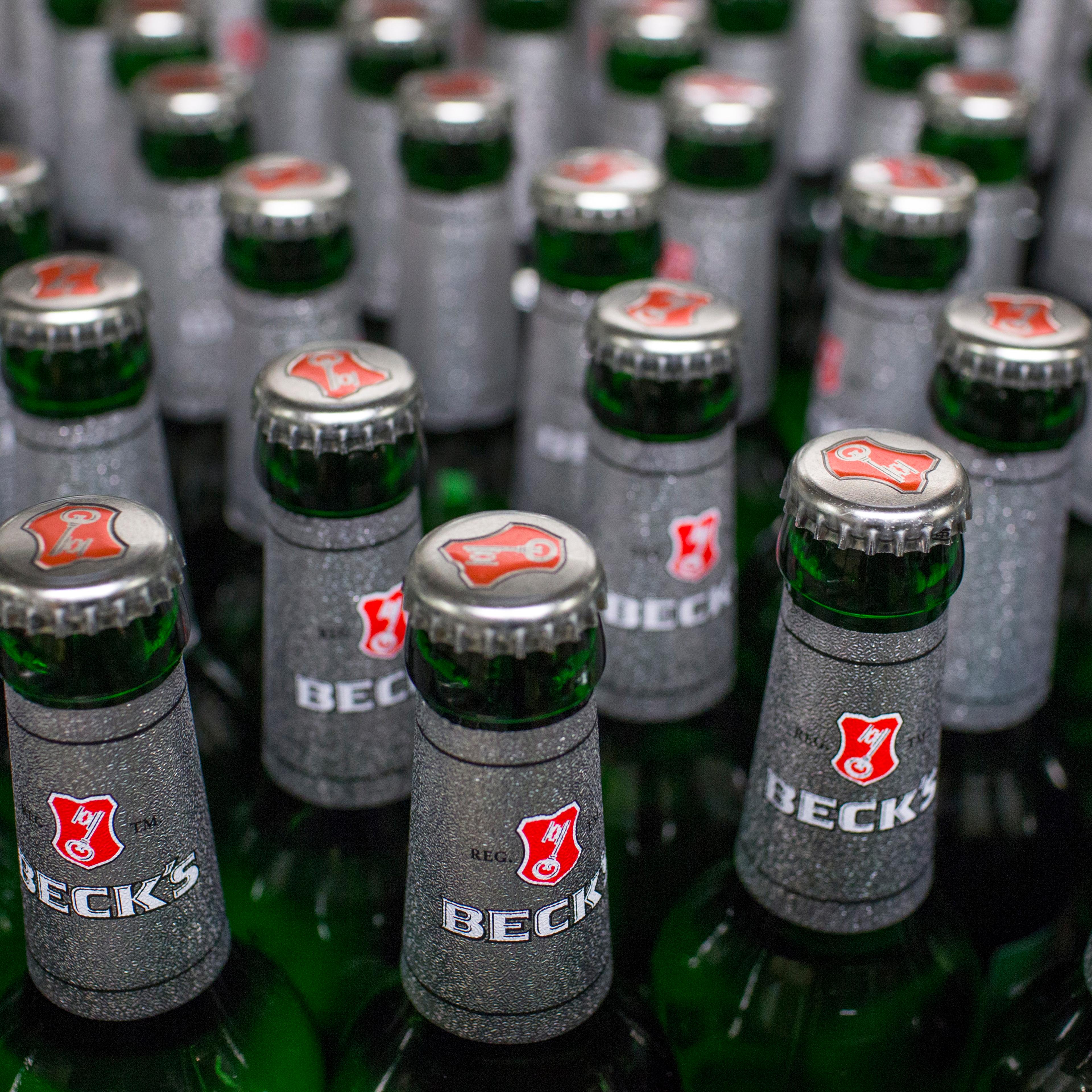 Bottles of Beck's lager beer move along the production line
