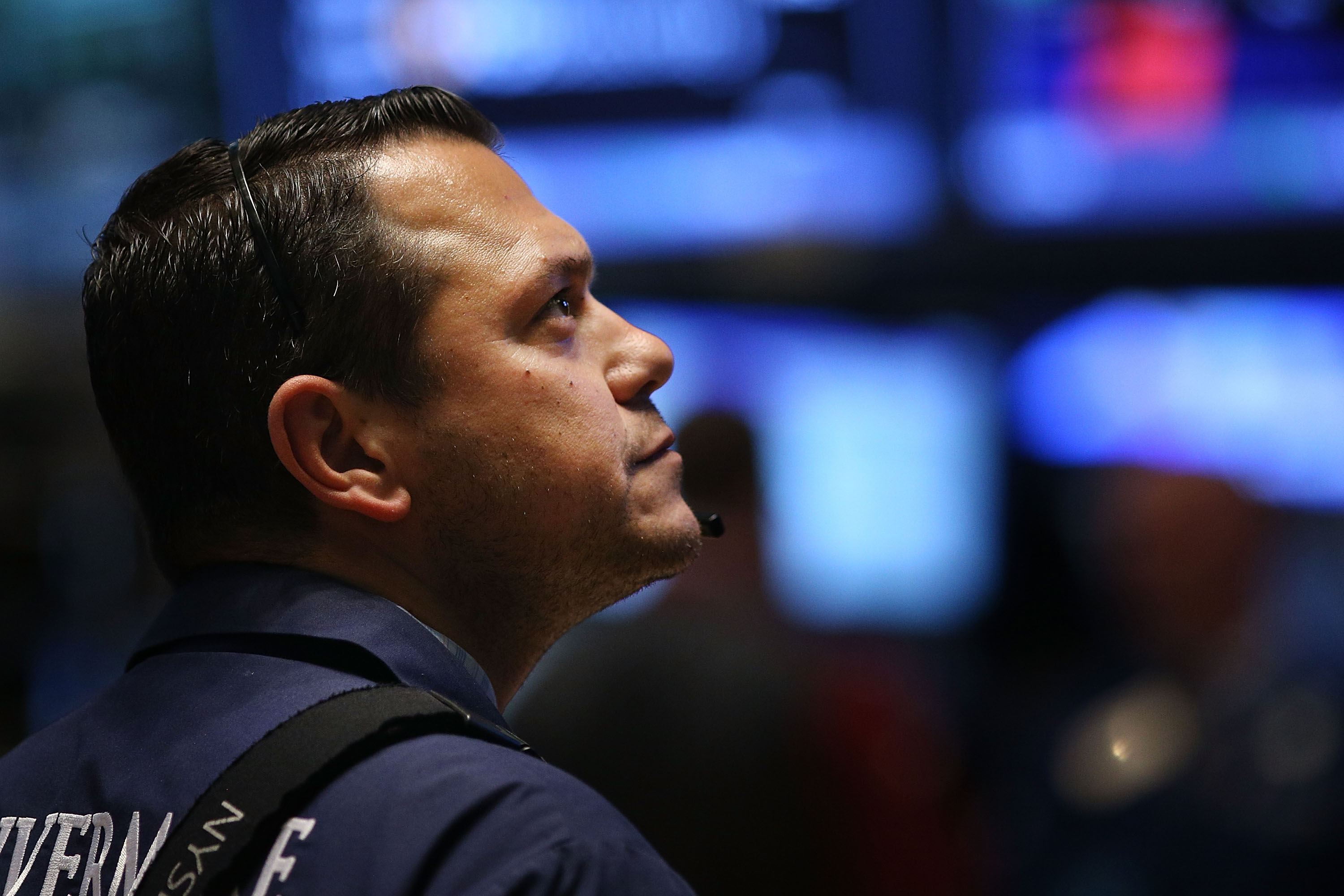 A trader works on the floor of the New York Stock Exchange (NYSE) on Oct. 21, 2014 in New York City.