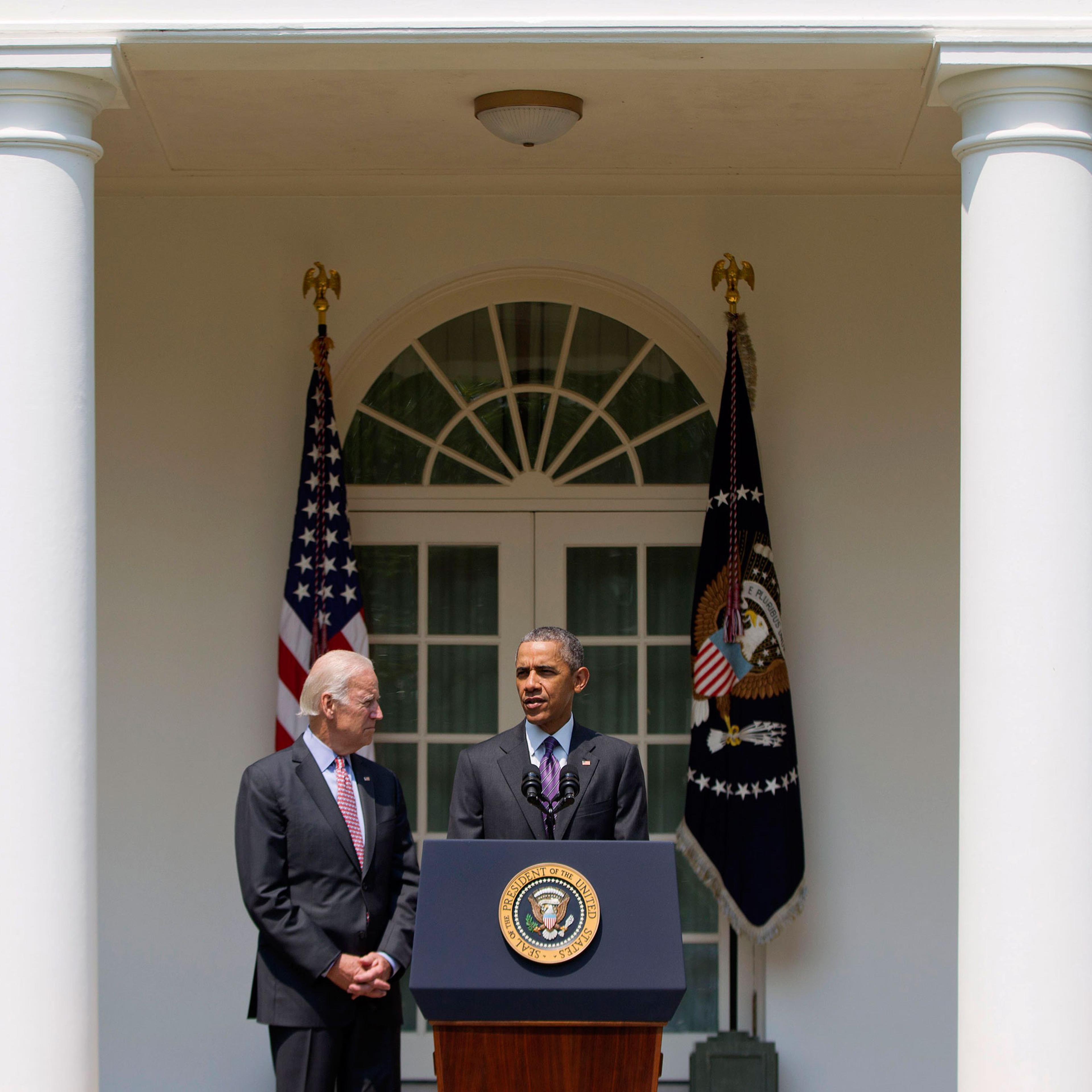 President Barack Obama, accompanied by Vice President Joe Biden, speaks in the Rose Garden of the White House in Washington, Wednesday, July 1, 2015. The president announced that US and Cuba have agreed to open embassies in each other's capitals, the big