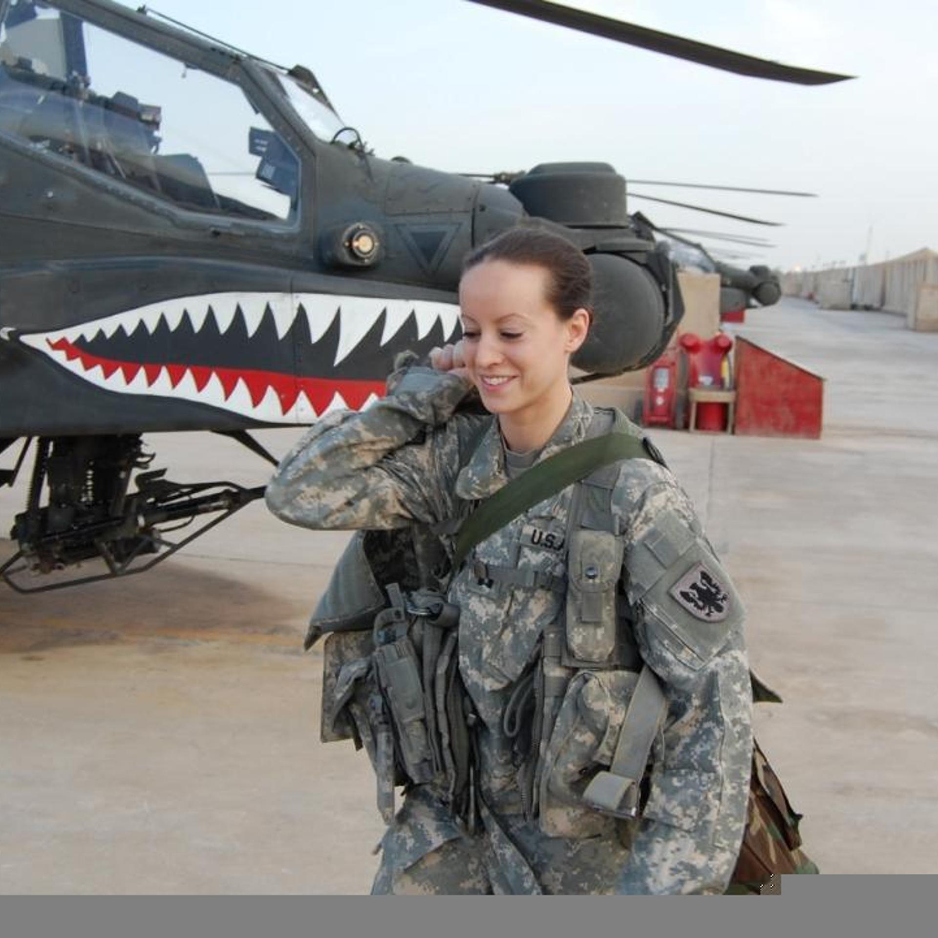 U.S. Army Captain Elizabeth McNamara, an AH-64 pilot, on the flight line in Iraq in 2011