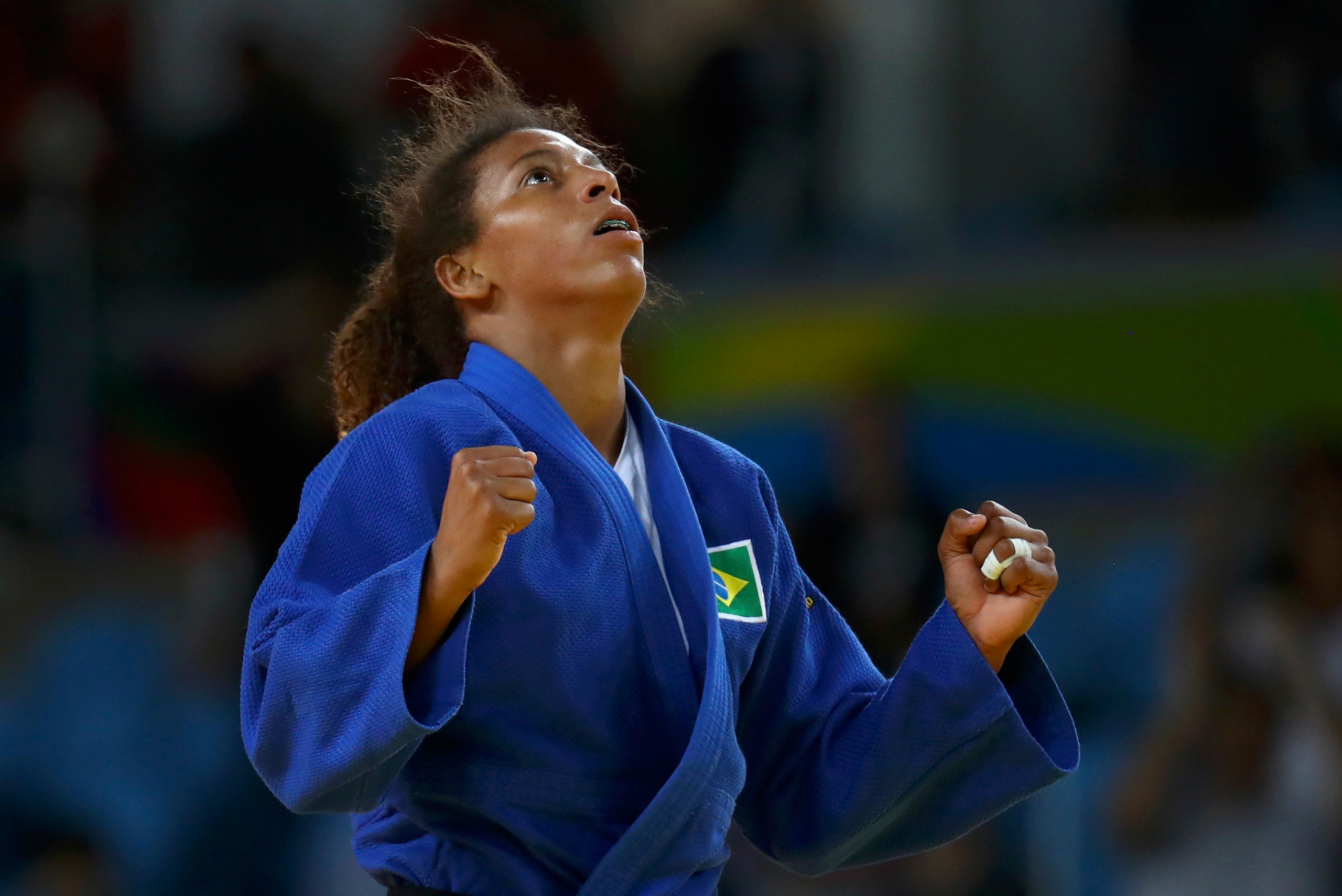 2016 Rio Olympics - Judo - Final - Women -57 kg Final - Gold Medal Contest - Carioca Arena 2 - Rio de Janeiro, Brazil - 08/08/2016. Rafaela Silva (BRA) of Brazil celebrates. REUTERS/Kai Pfaffenbach FOR EDITORIAL USE ONLY. NOT FOR SALE FOR MARKETING OR AD