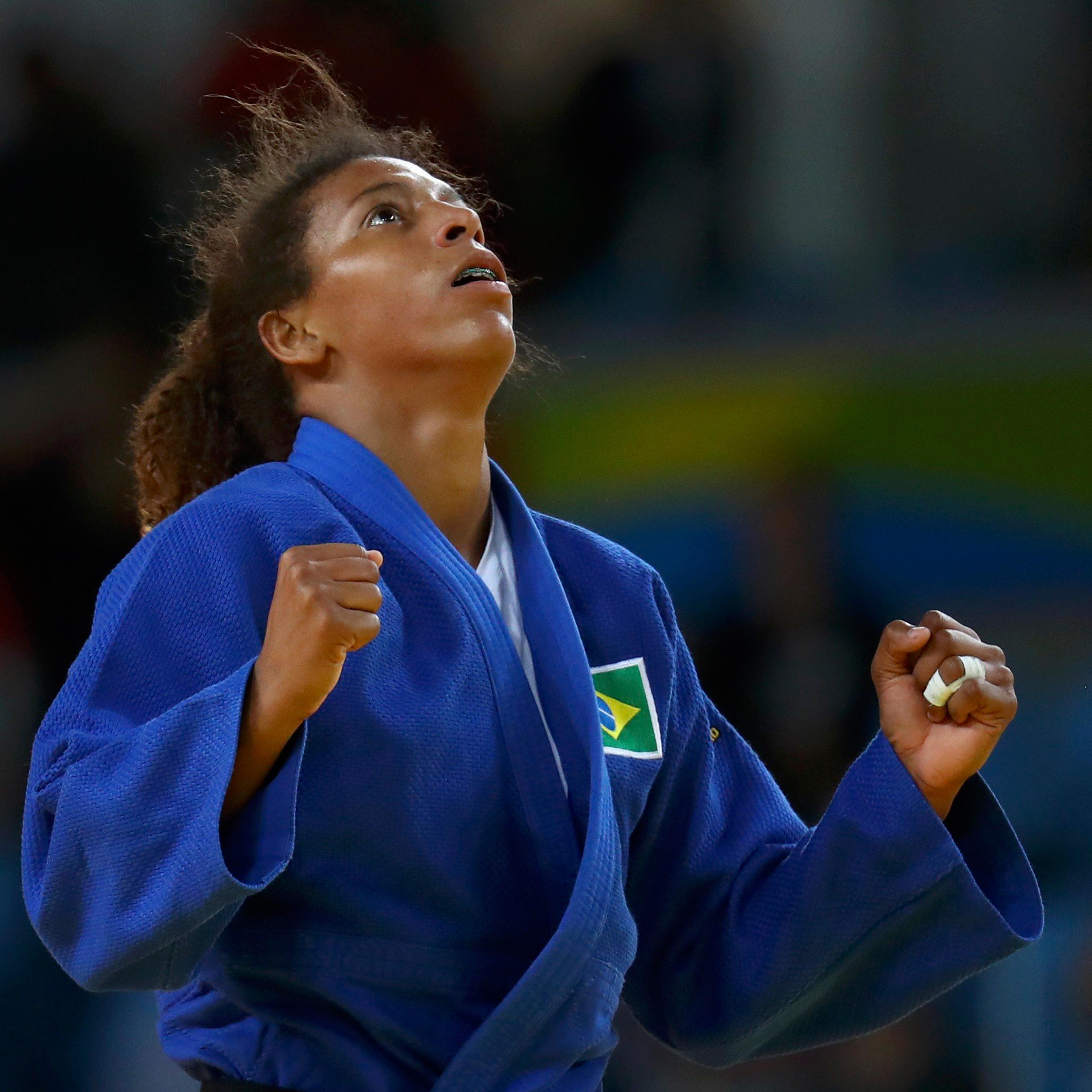 2016 Rio Olympics - Judo - Final - Women -57 kg Final - Gold Medal Contest - Carioca Arena 2 - Rio de Janeiro, Brazil - 08/08/2016. Rafaela Silva (BRA) of Brazil celebrates. REUTERS/Kai Pfaffenbach FOR EDITORIAL USE ONLY. NOT FOR SALE FOR MARKETING OR AD