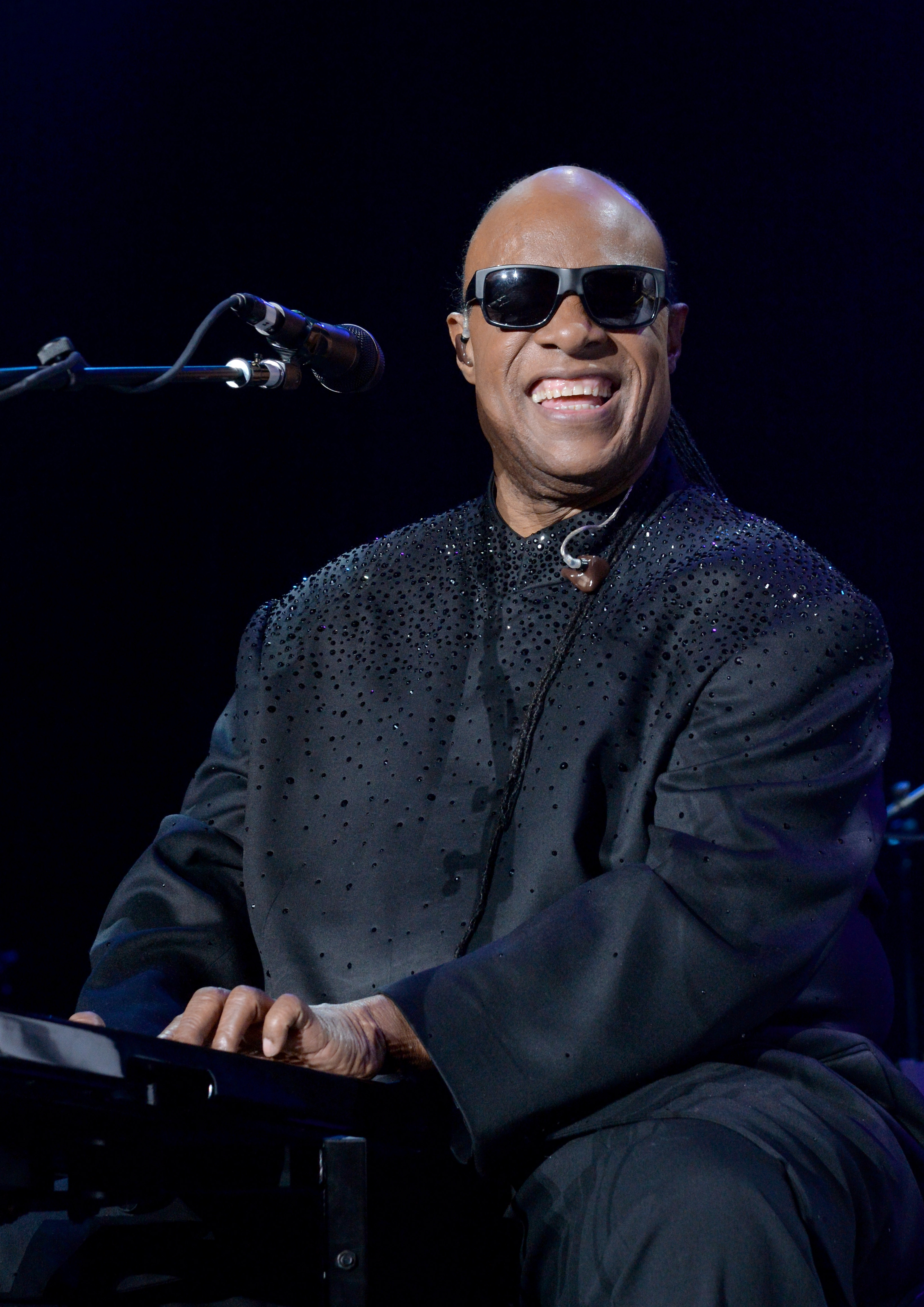 performs onstage during the 19th Annual House Full Of Toys Benefit Concert "Songs In the Key Of Life" performance at The Forum on December 20, 2014 in Inglewood, California.