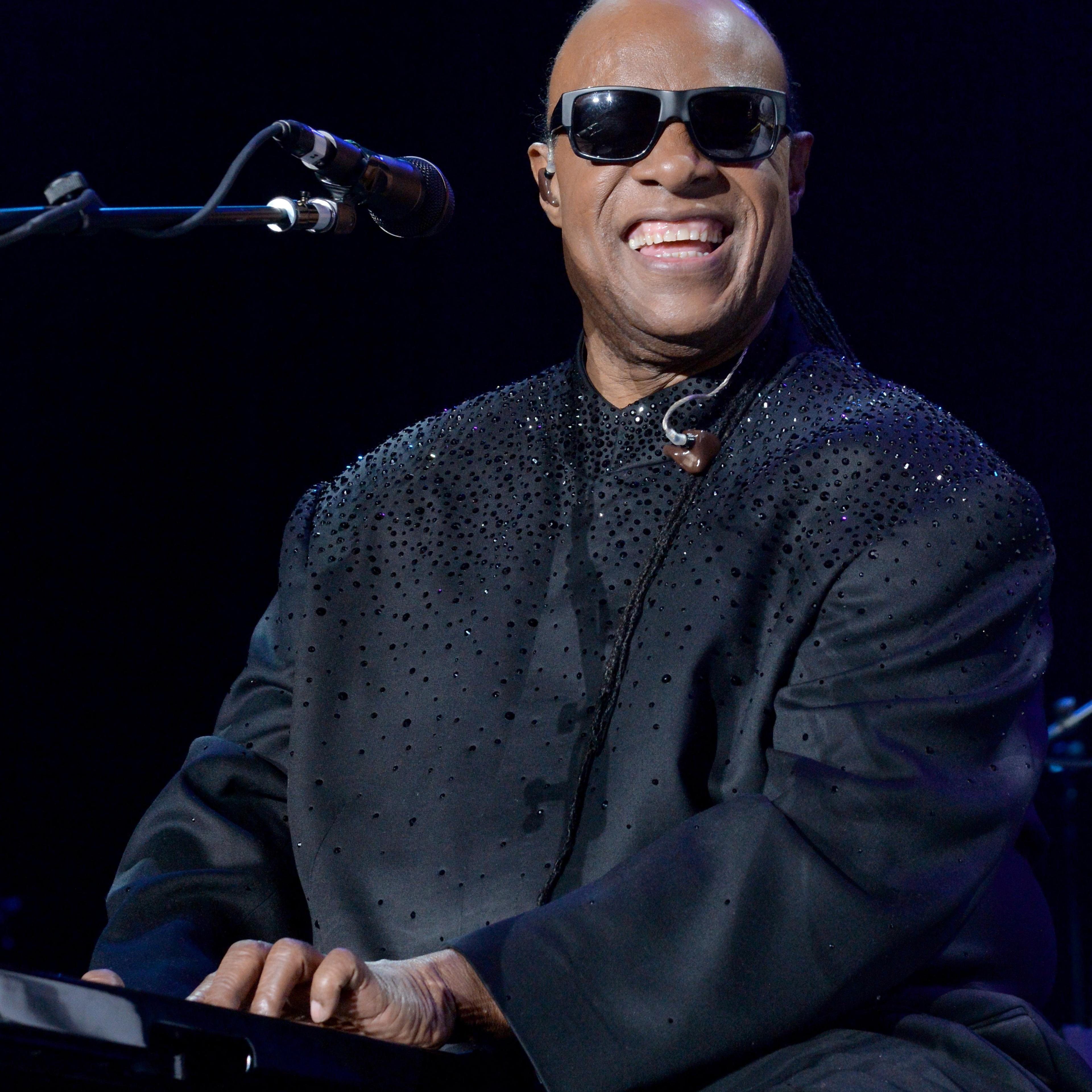 performs onstage during the 19th Annual House Full Of Toys Benefit Concert "Songs In the Key Of Life" performance at The Forum on December 20, 2014 in Inglewood, California.