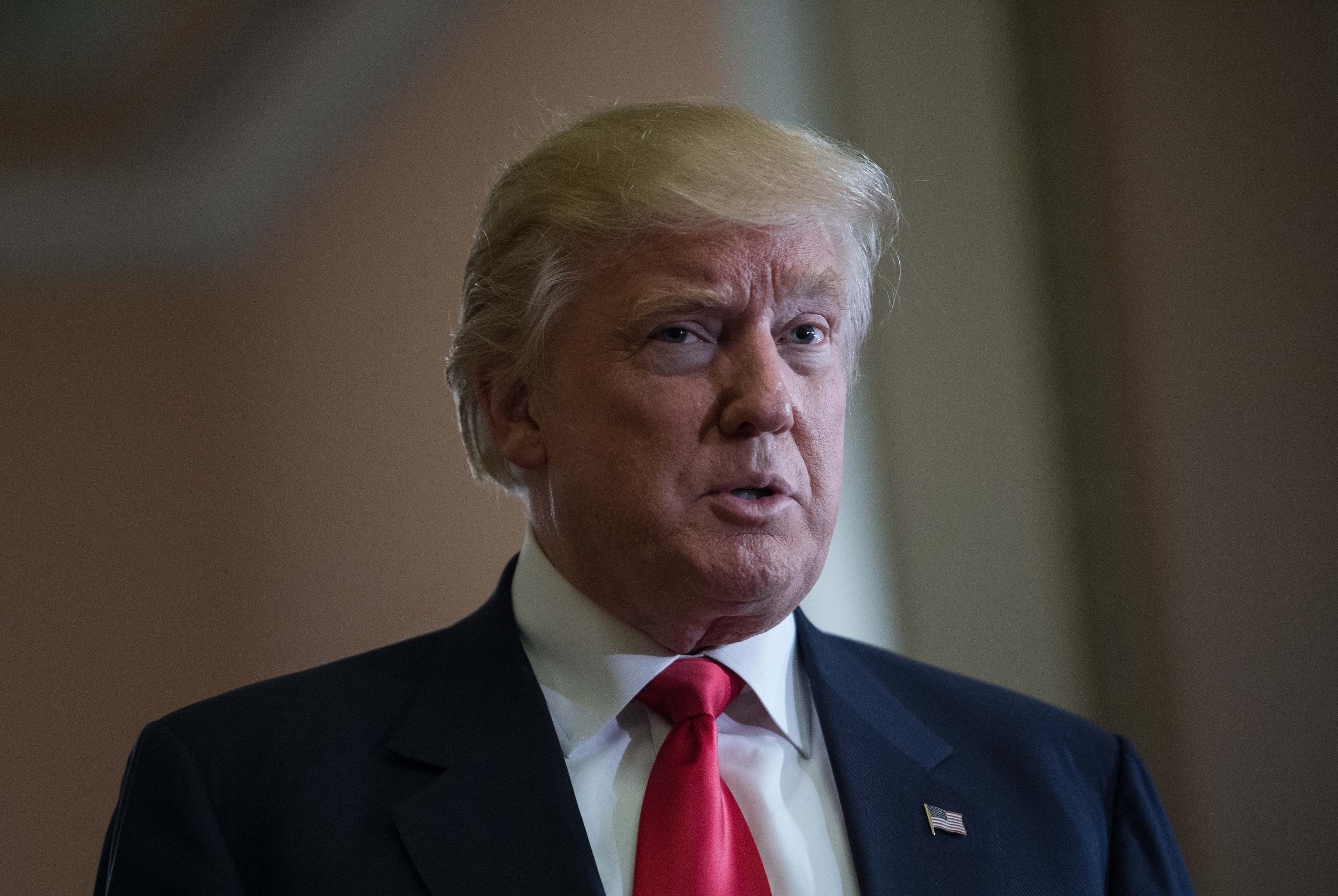 U.S. President-elect Donald Trump speaks to the press following a meeting with Senate Majority Leader Mitch McConnell at the Capitol in Washington, D.C., on Nov. 10, 2016.