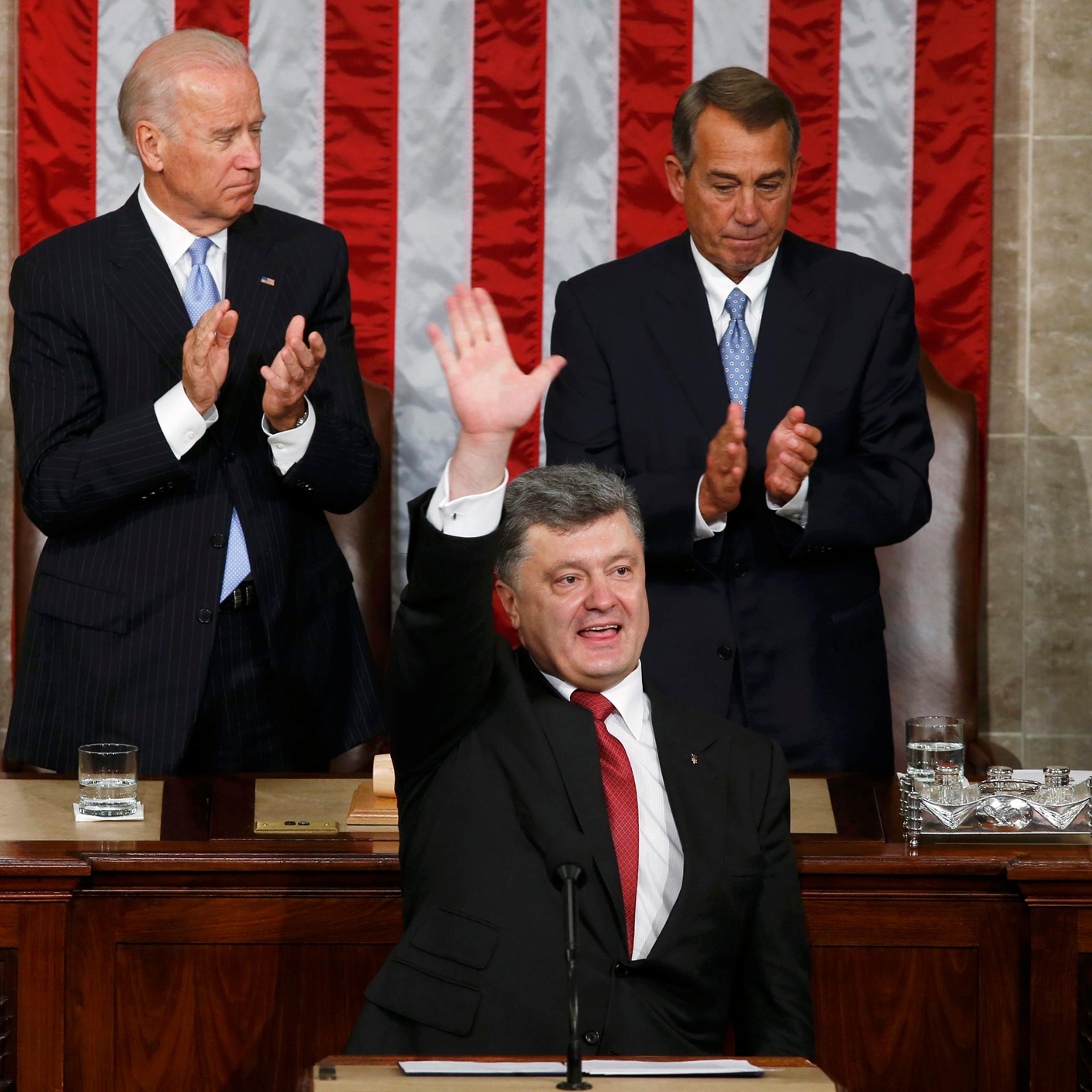Ukraine President Petro Poroshenko acknowledges applause after addressing a joint meeting of Congress in the U.S. Capitol in Washington, Sept. 18, 2014.