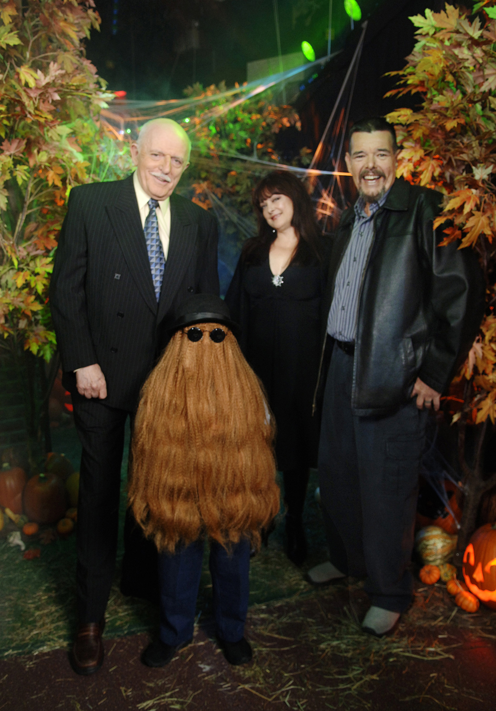This Oct. 31, 2006, photo provided by ABC, shows some of the original cast of the TV show <i>The Addams Family</i>. From left: John Astin (Gomez Addams), Felix Silla (Cousin Itt), Lisa Loring (Wednesday Addams) and Ken Weatherwax (Pugsley Addams) reunited at a special Halloween edition of ABC's <i>Good Morning America</i> outside their Times Square studios in New York City 