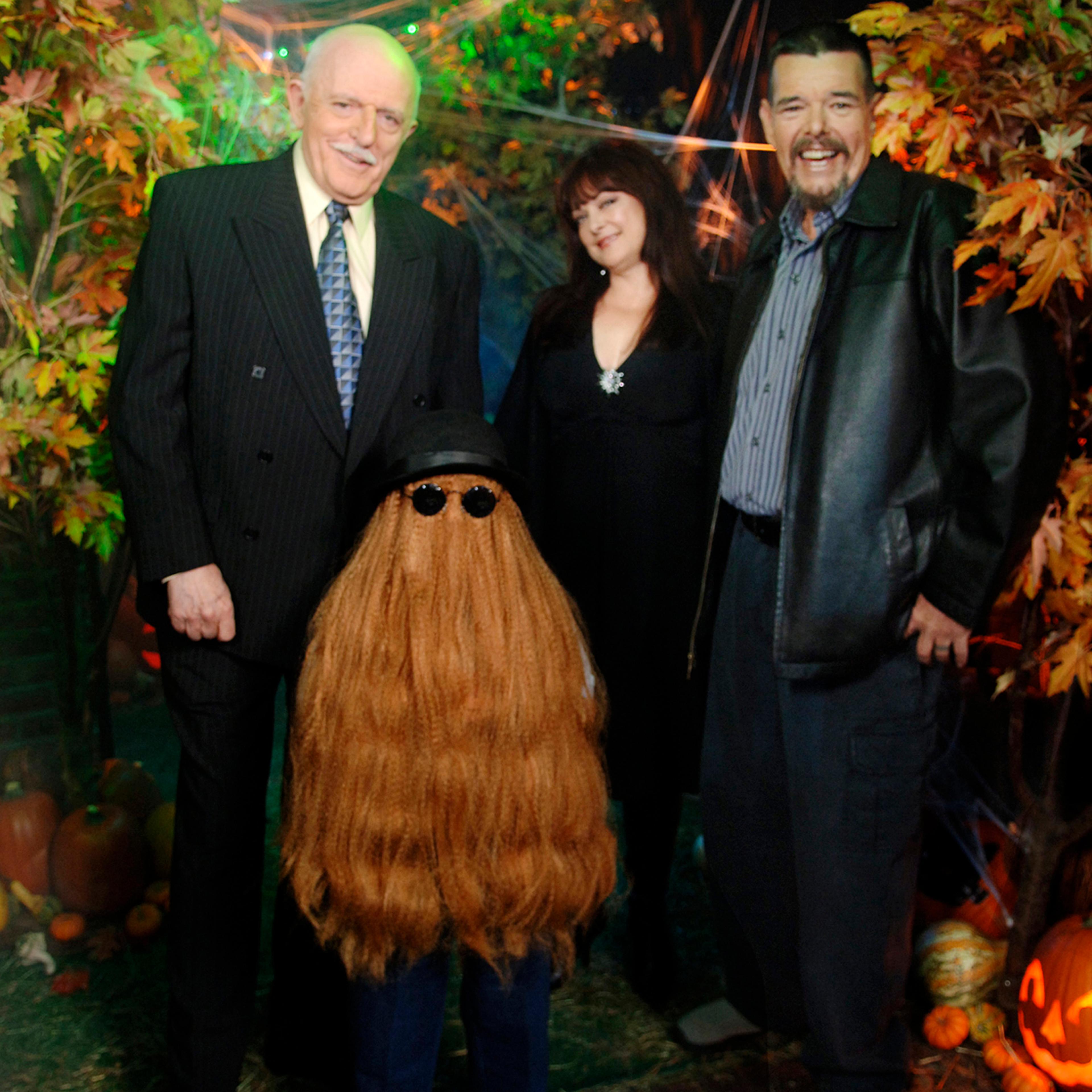 This Oct. 31, 2006, photo provided by ABC, shows some of the original cast of the TV show <i>The Addams Family</i>. From left: John Astin (Gomez Addams), Felix Silla (Cousin Itt), Lisa Loring (Wednesday Addams) and Ken Weatherwax (Pugsley Addams) reunited at a special Halloween edition of ABC's <i>Good Morning America</i> outside their Times Square studios in New York City