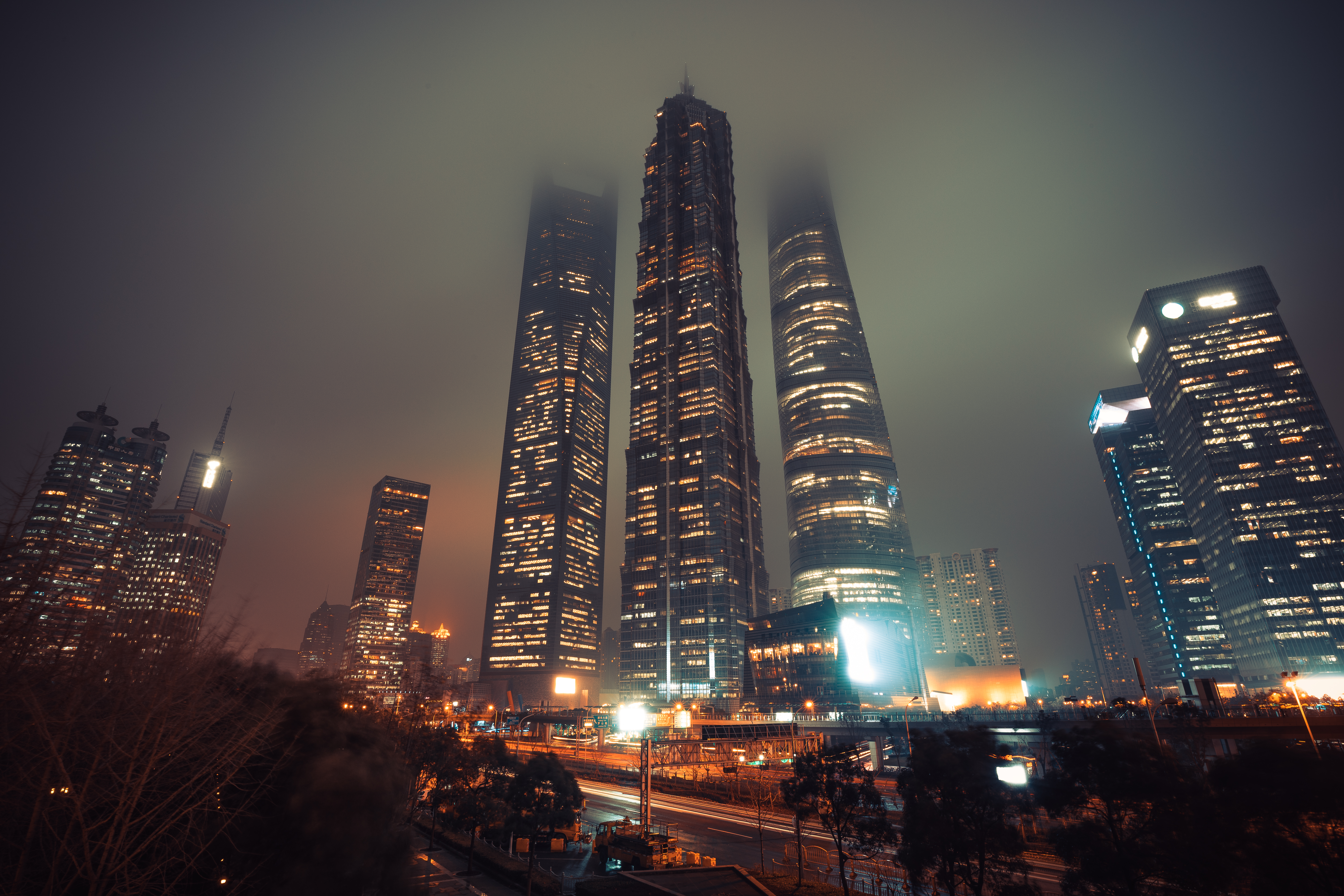 Shanghai financial district during foggy night , China , Asia