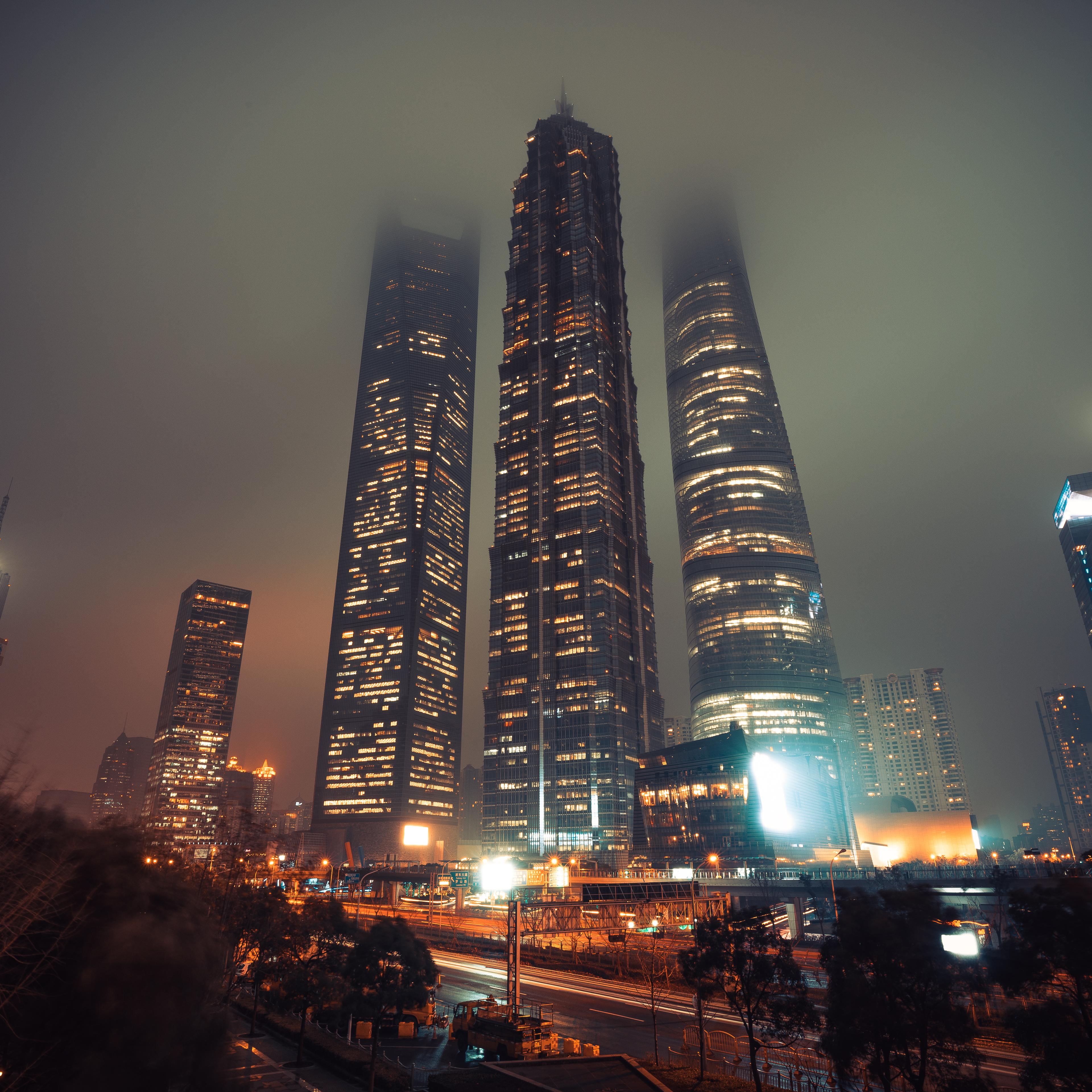 Shanghai financial district during foggy night , China , Asia