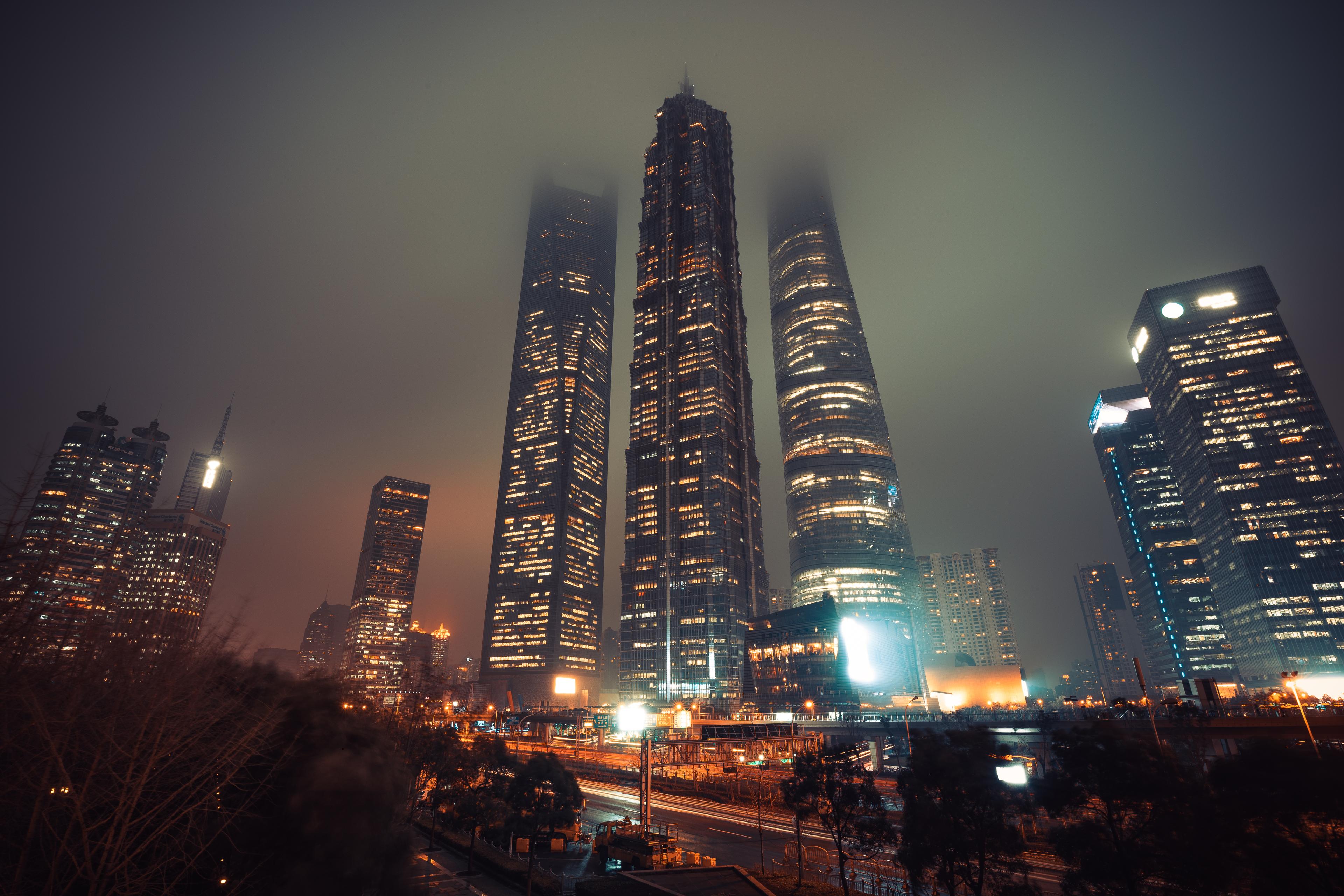 Shanghai financial district during foggy night , China , Asia