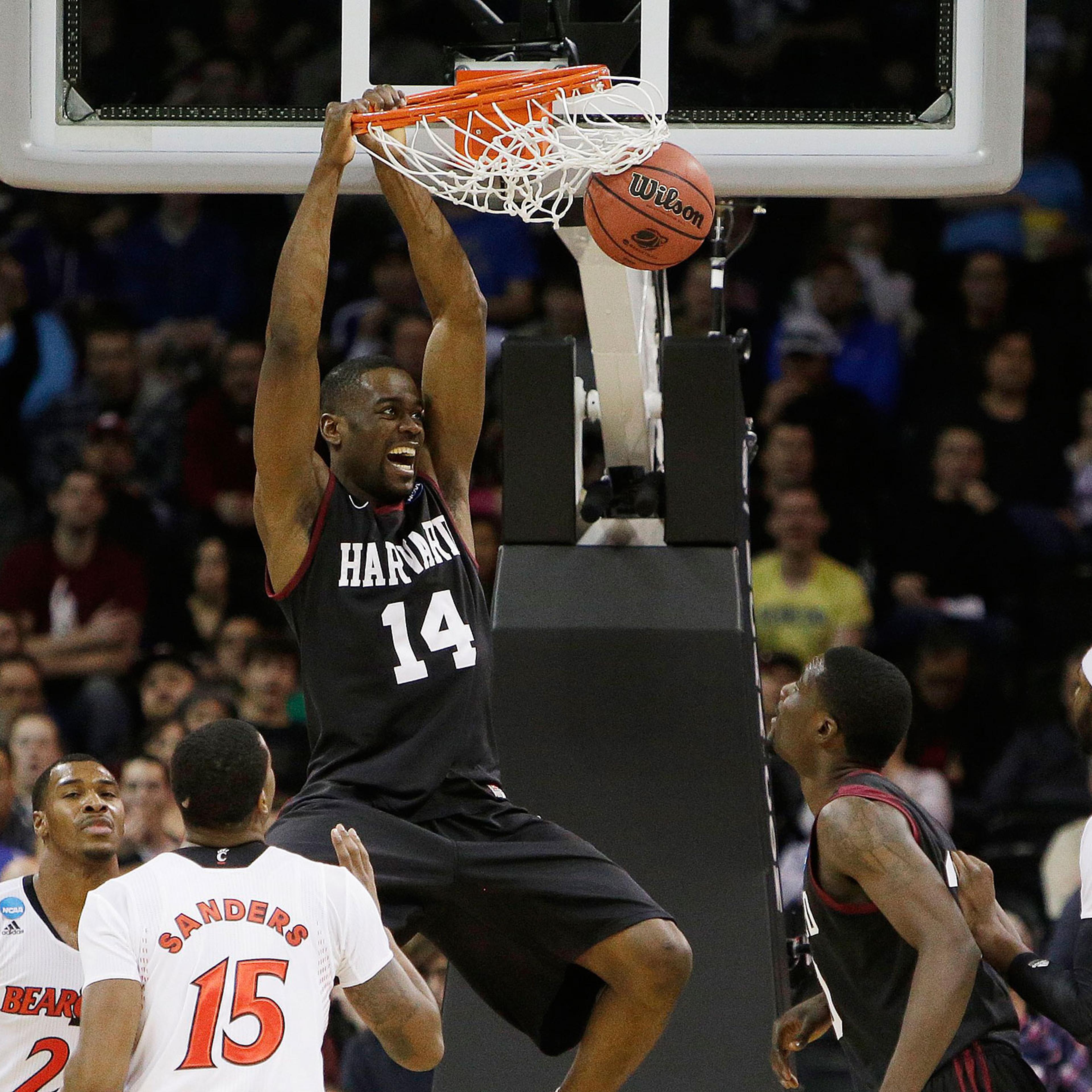 HarvardÃs Steve Moundou-Missi dunks against Cincinnati in the second half during the second-round of the NCAA men's college basketball tournament in Spokane, Wash., March 20, 2014.