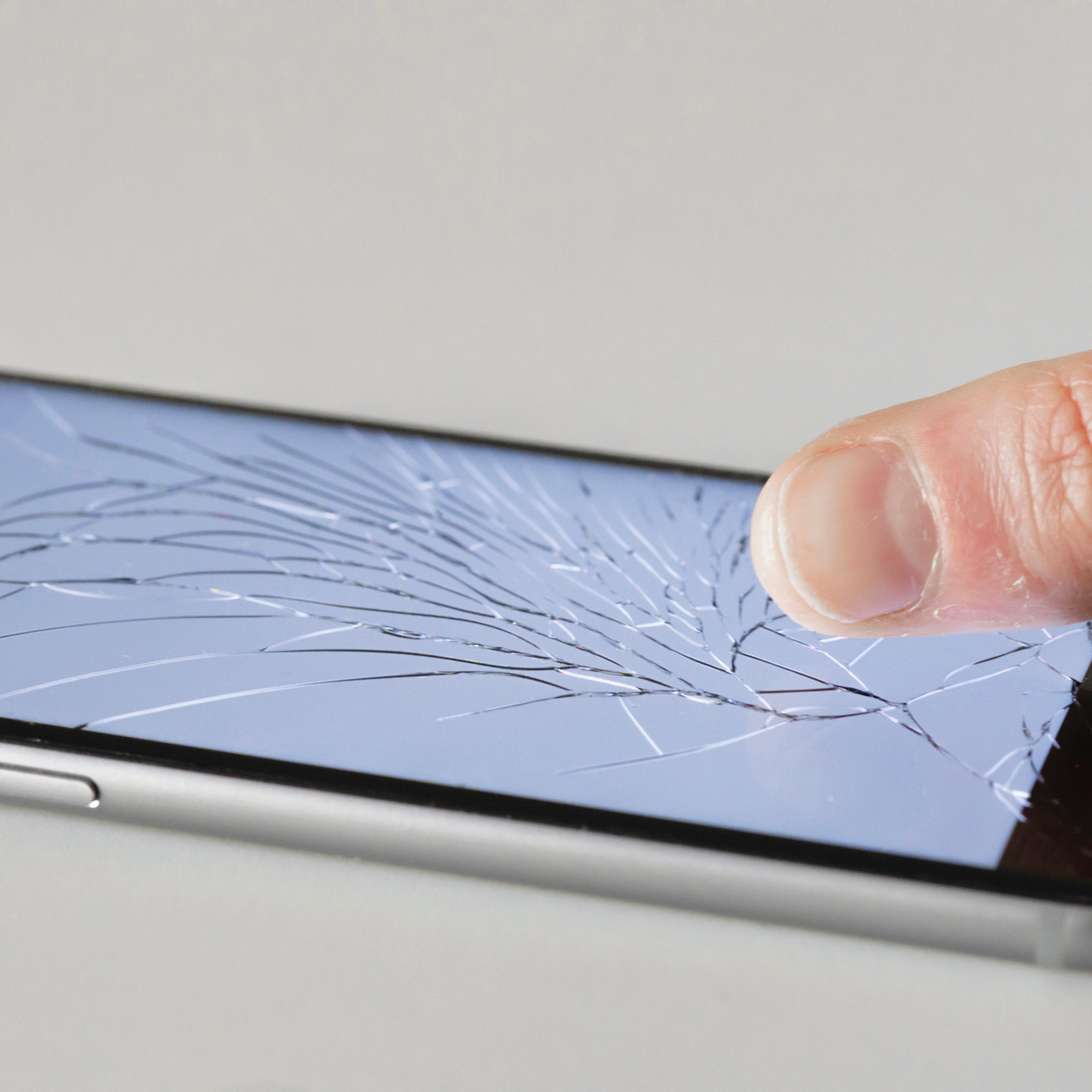 Berlin, Germany - March 05: Apple Iphone with shattered glass on March 05, 2018 in Berlin, Germany.