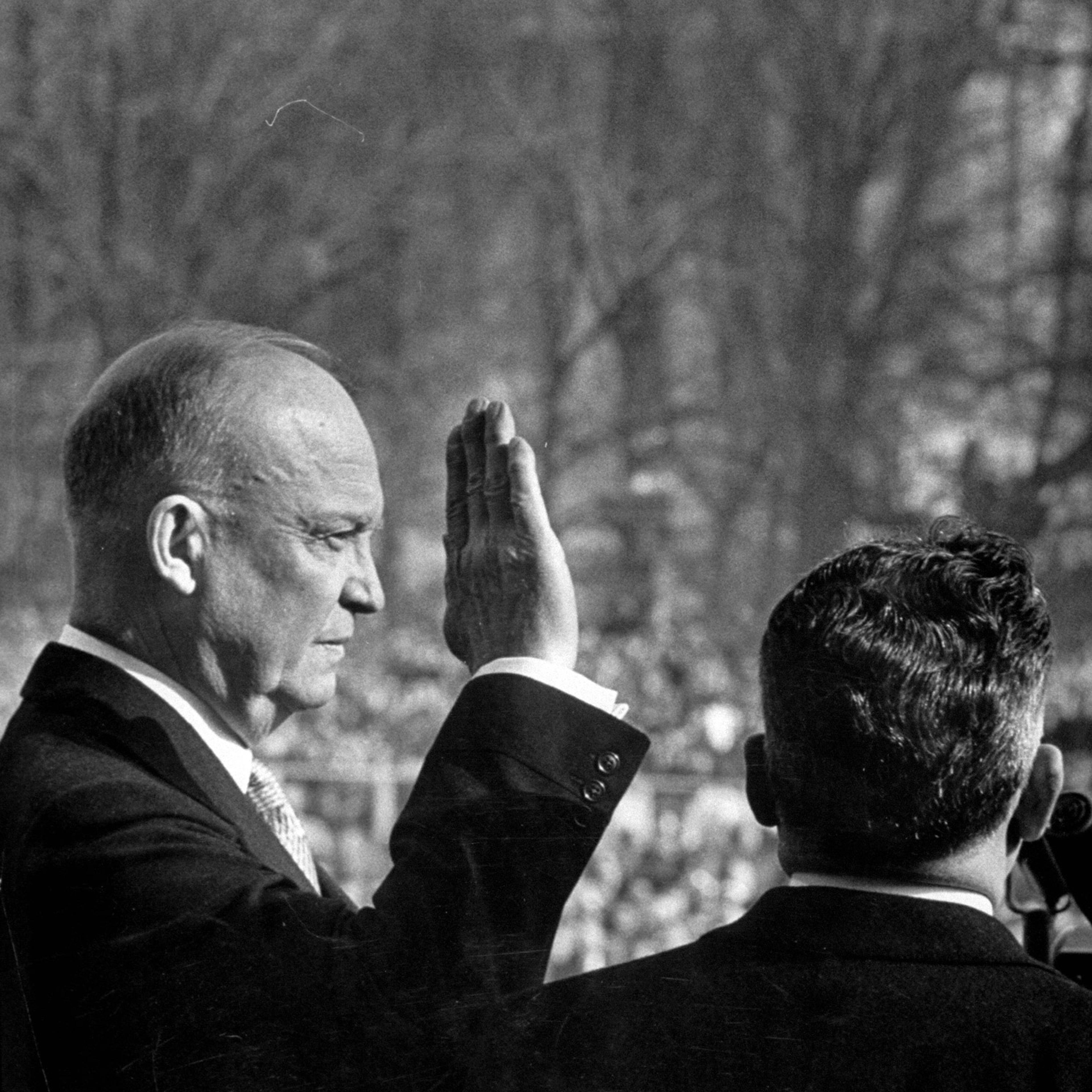 Dwight D. Eisenhower taking his first oath of office during inauguration, 1953.