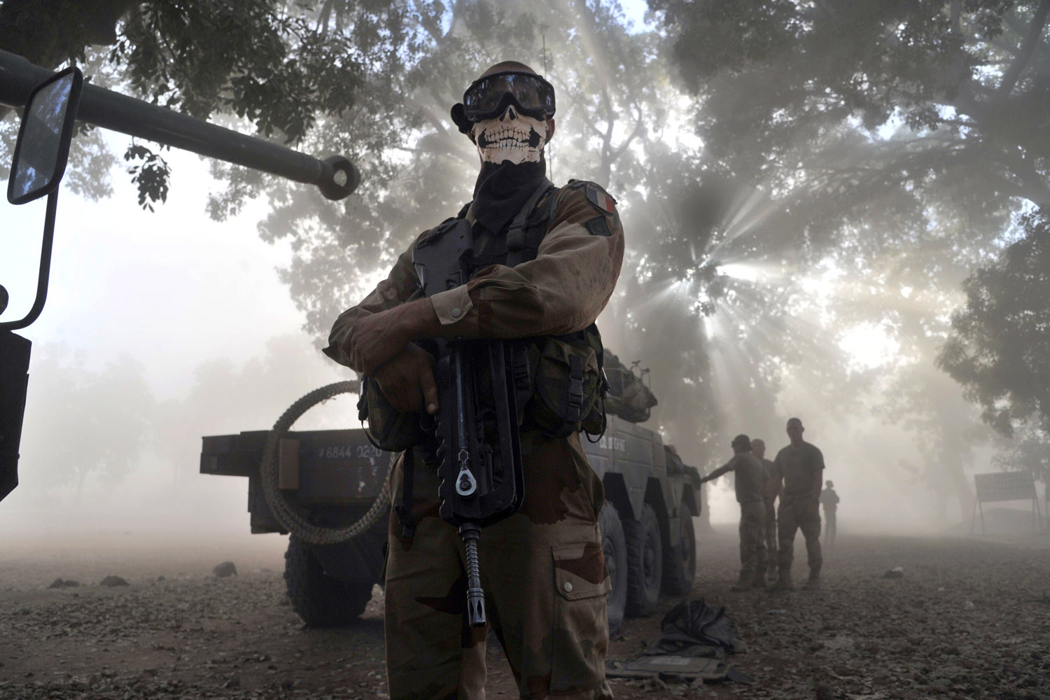 Jan. 20, 2013.  A French soldier wearing a skeleton mask stands next to a tank in a street in Niono, Mali. 
<br><br>
<i><b>Related:</b> <a href="http://world.time.com/2013/01/24/war-in-mali-france-and-african-allies-take-on-islamist-militants/">See more photos from the unfolding conflict in Mali</a></i>