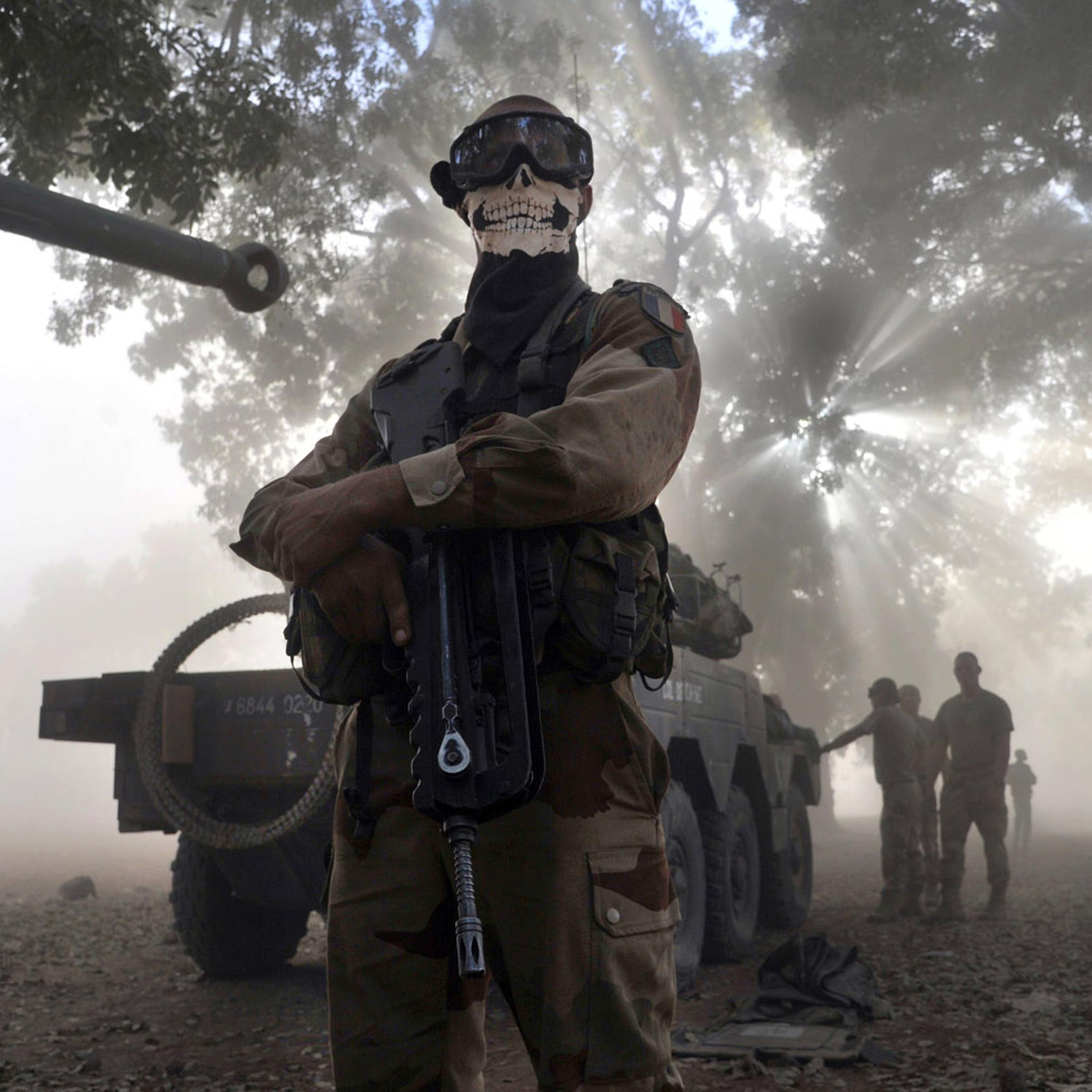 Jan. 20, 2013. A French soldier wearing a skeleton mask stands next to a tank in a street in Niono, Mali.
<br><br>
<i><b>Related:</b> <a href="http://world.time.com/2013/01/24/war-in-mali-france-and-african-allies-take-on-islamist-militants/">See more photos from the unfolding conflict in Mali</a></i>