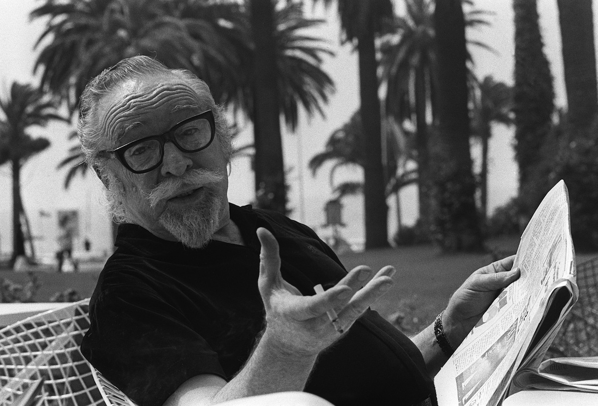 American movie director Dalton Trumbo pose for pho