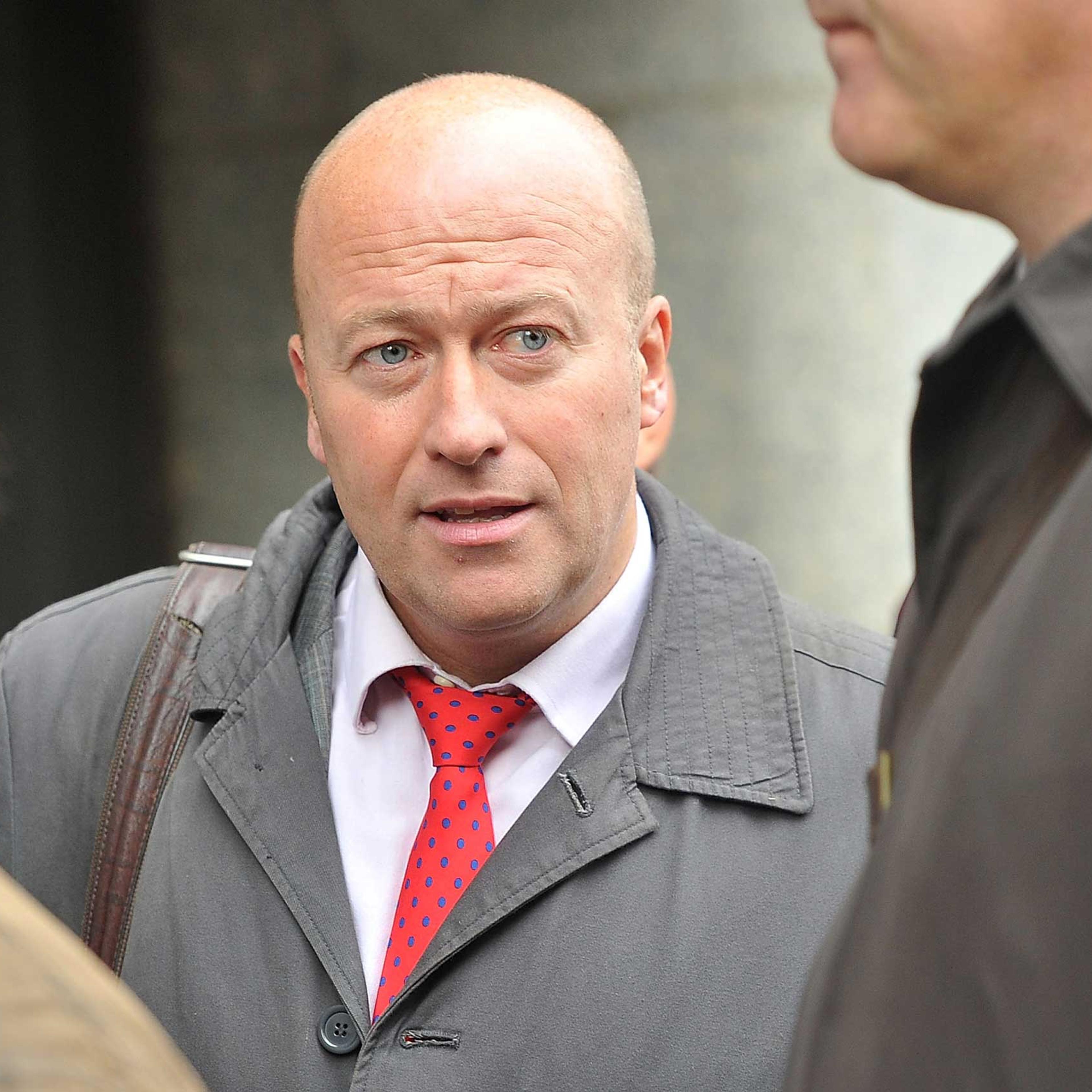 Ian Edmondson, former head of news at the News of the World, arrives at the Old Bailey court in central London on Sept. 26, 2012 in London.
