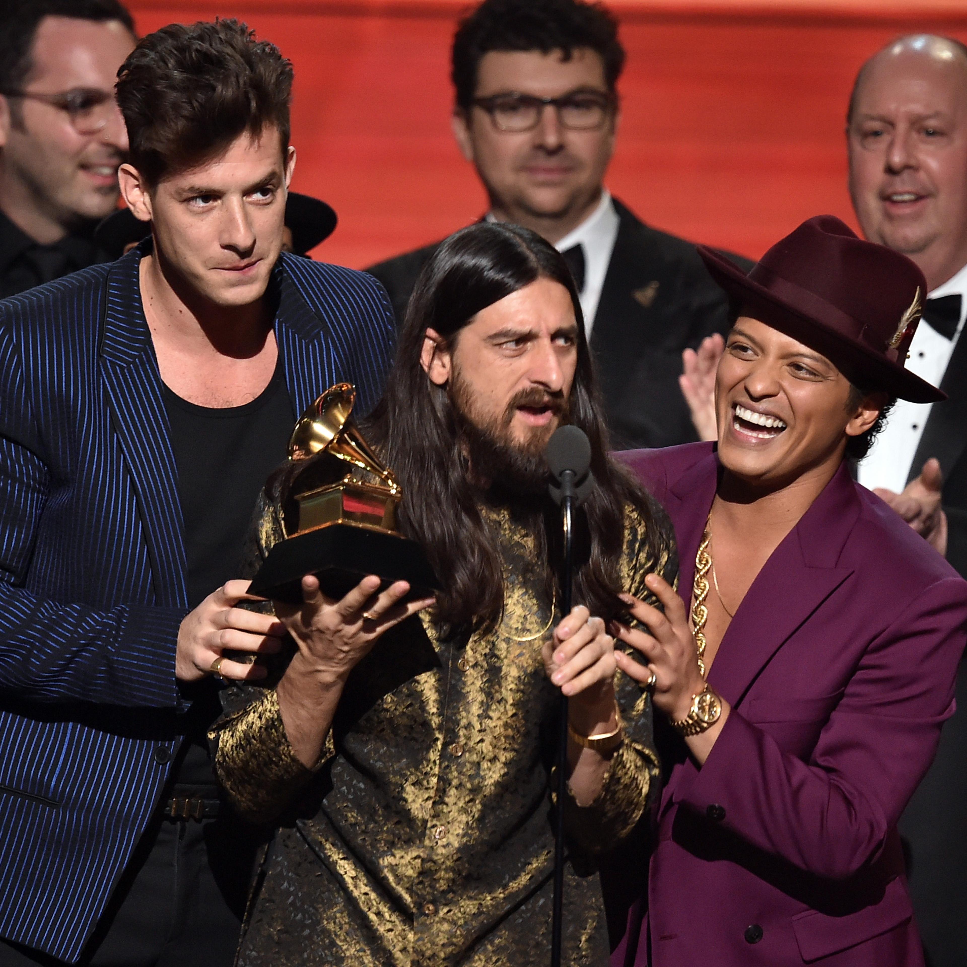 From left: Mark Ronson, Jeff Bhasker, and Bruno Mars accept "Record Of The Year" during the 58th GRAMMY Awards at Staples Center on Feb. 15, 2016 in Los Angeles.