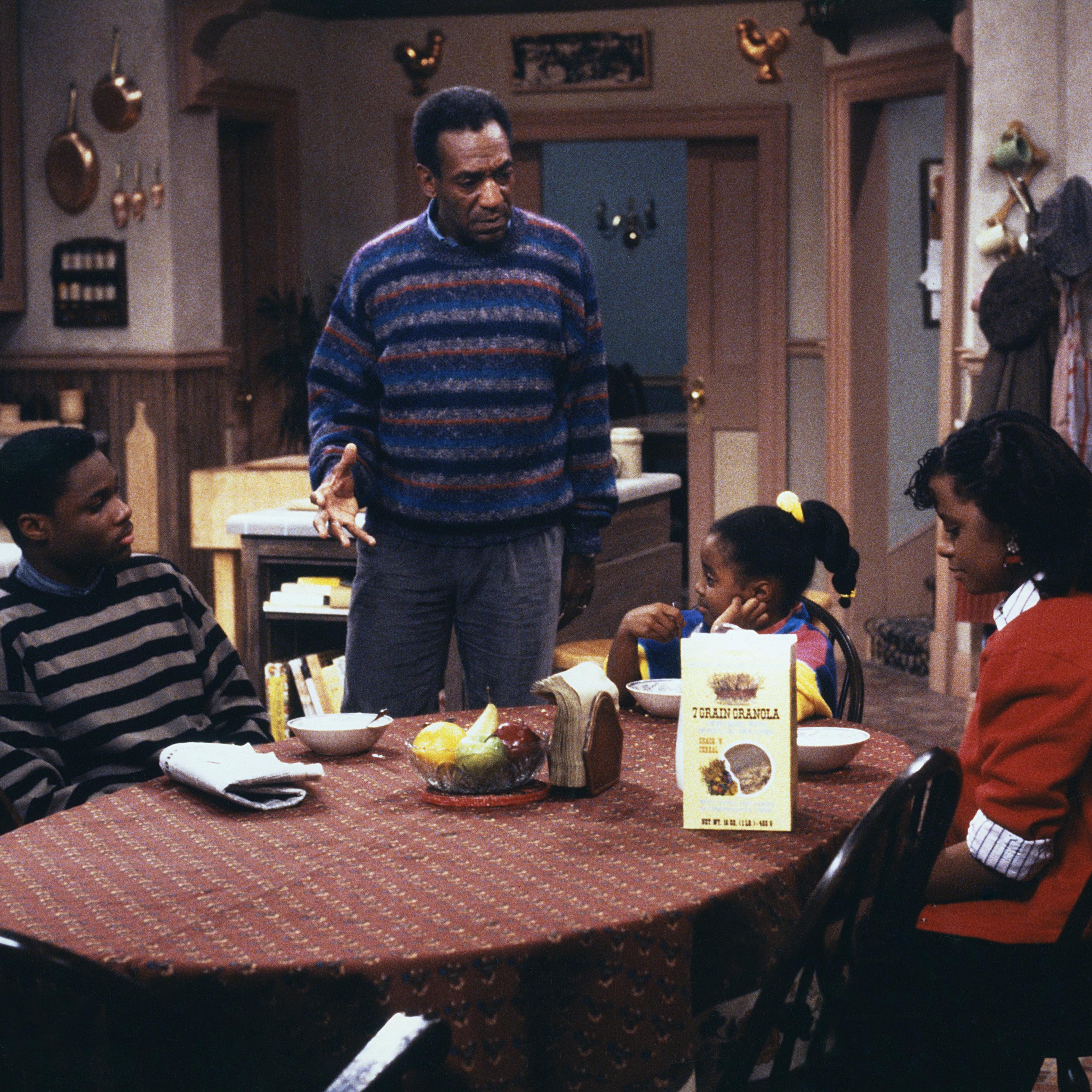 (Left to Right) Malcolm-Jamal Warner as Theodore 'Theo' Huxtable, Bill Cosby as Dr. Heathcliff 'Cliff' Huxtable, Keshia Knight Pulliam as Rudy Huxtable, Tempestt Bledsoe as Vanessa Huxtable on The Cosby Show.