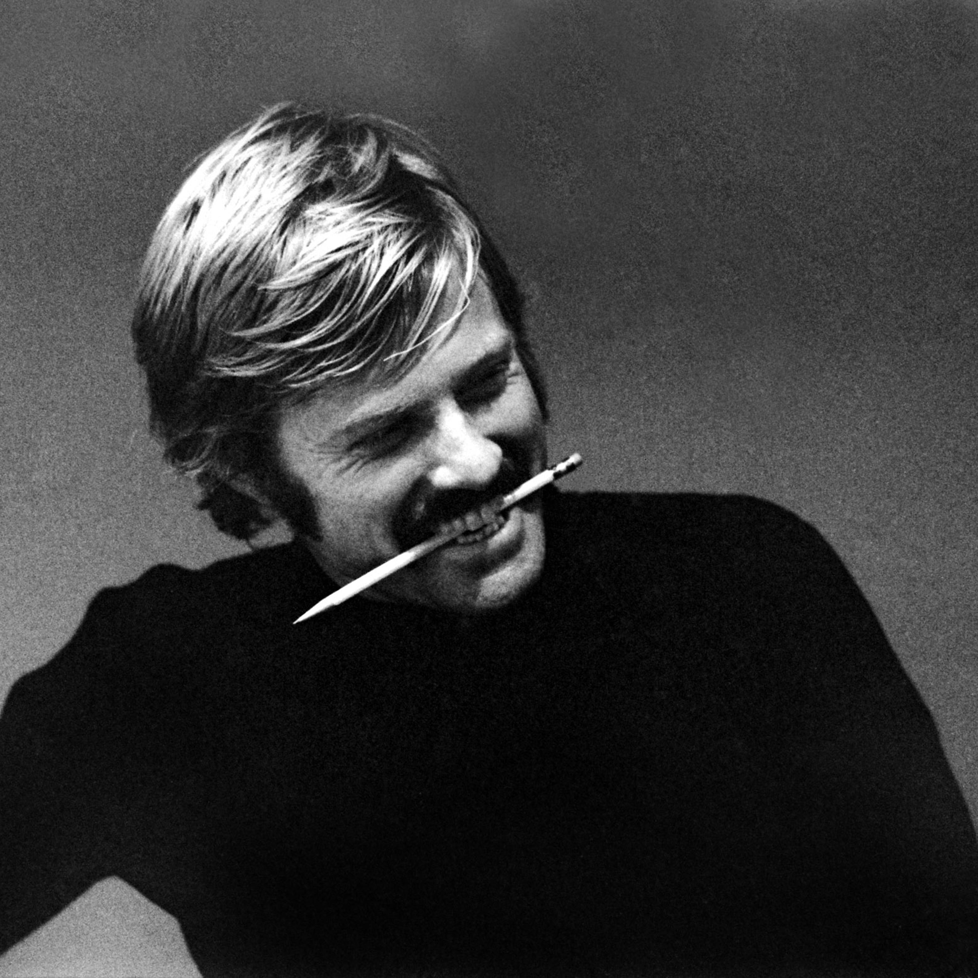 Robert Redford grins in his agent's office in New York 1969