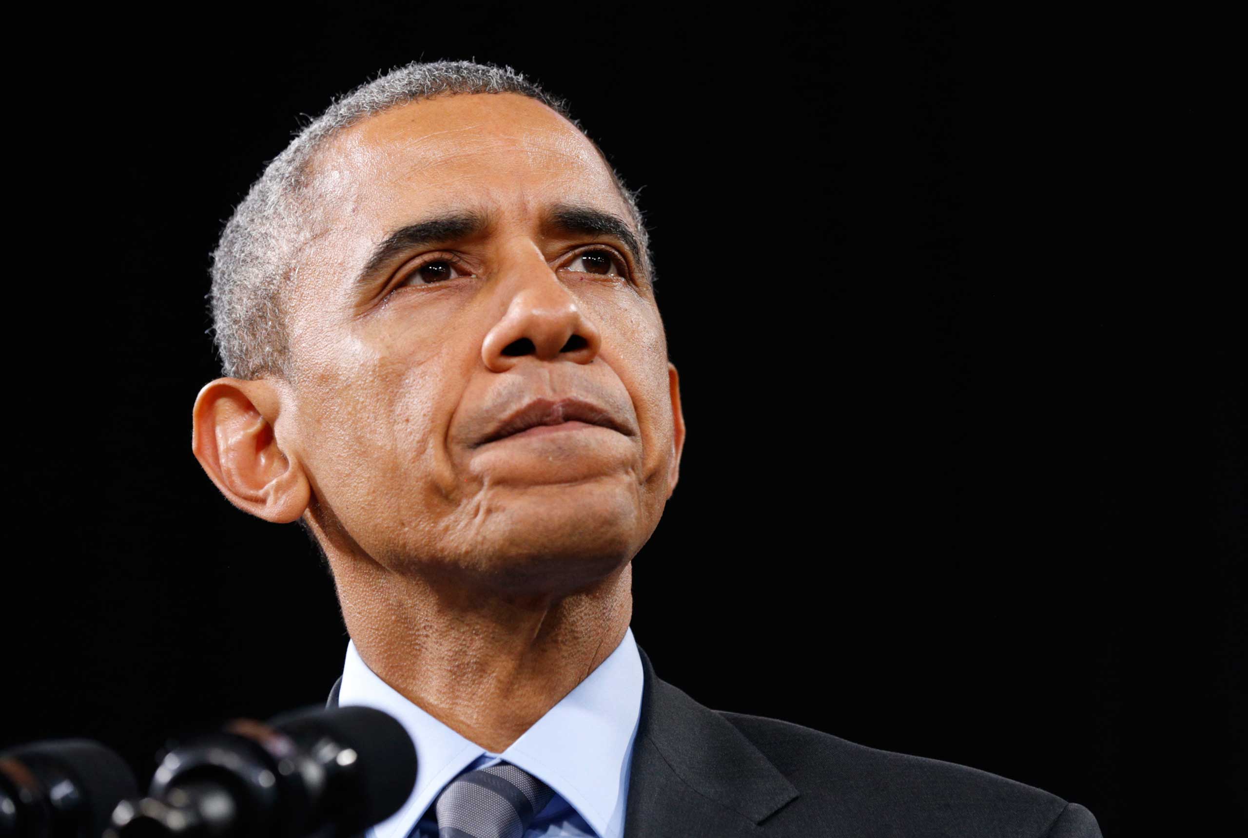 U.S. President Barack Obama pauses while speaking about immigration reform during a visit to Del Sol High School in Las Vegas, Nevada