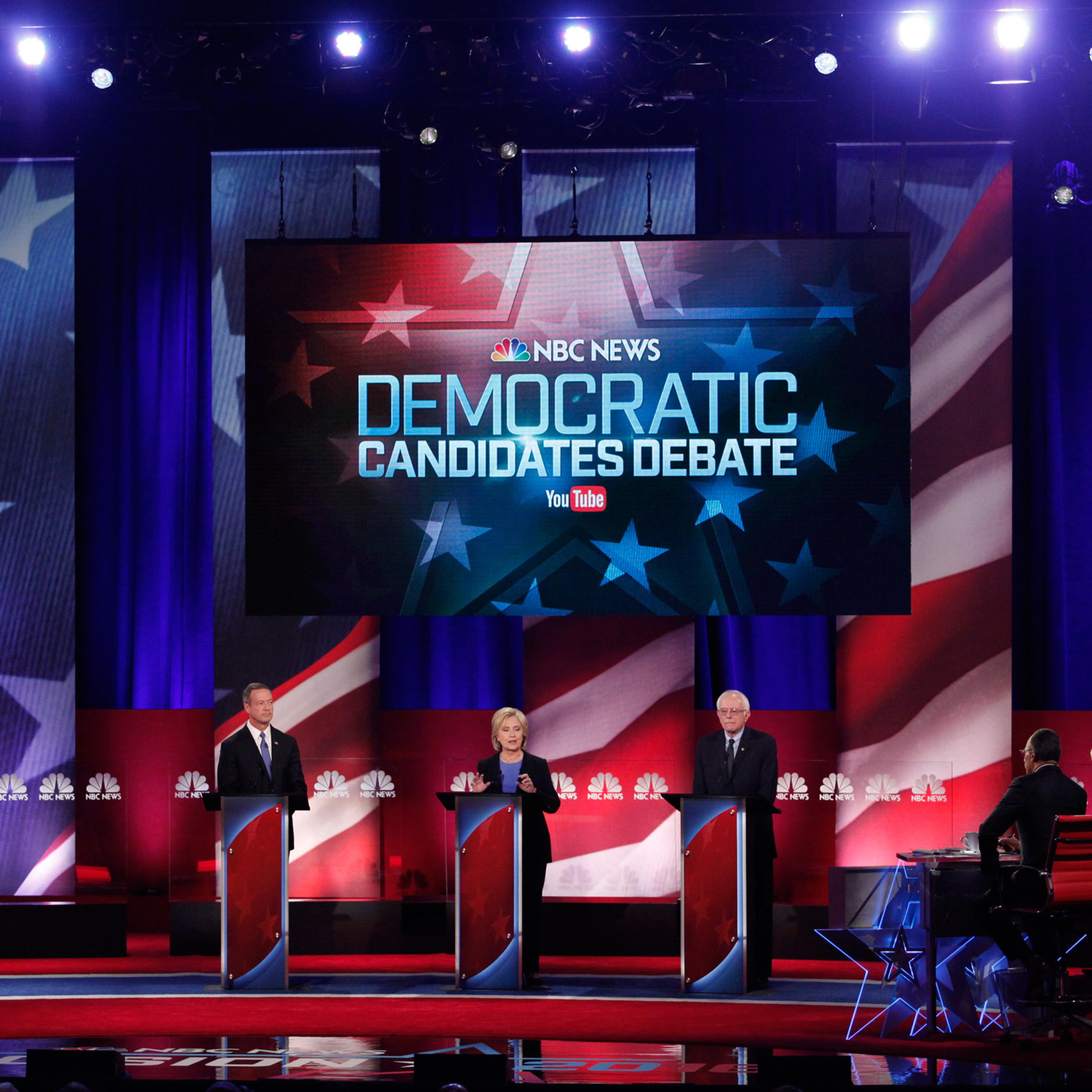 Democratic U.S. presidential candidates (L-R) former Governor Martin O'Malley, former Secretary of State Hillary Clinton and U.S. Senator Bernie Sanders begin to debate at the start of the NBC News - YouTube Democratic presidential candidates debate in C