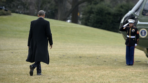 U.S. President Barack Obama walks out of the residence toward Marine One while departing the White House, on February 10, 2016 in Washington, DC.