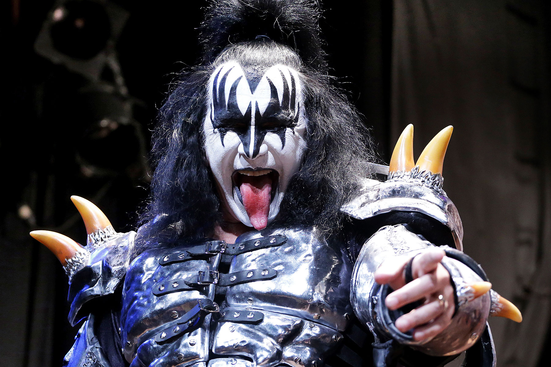 Gene Simmons, a member of the rock band Kiss, poses during an announcement that Kiss and Def Leppard will team up this summer for a 42-city North American tour, at the House of Blues in West Hollywood, California March 17, 2014