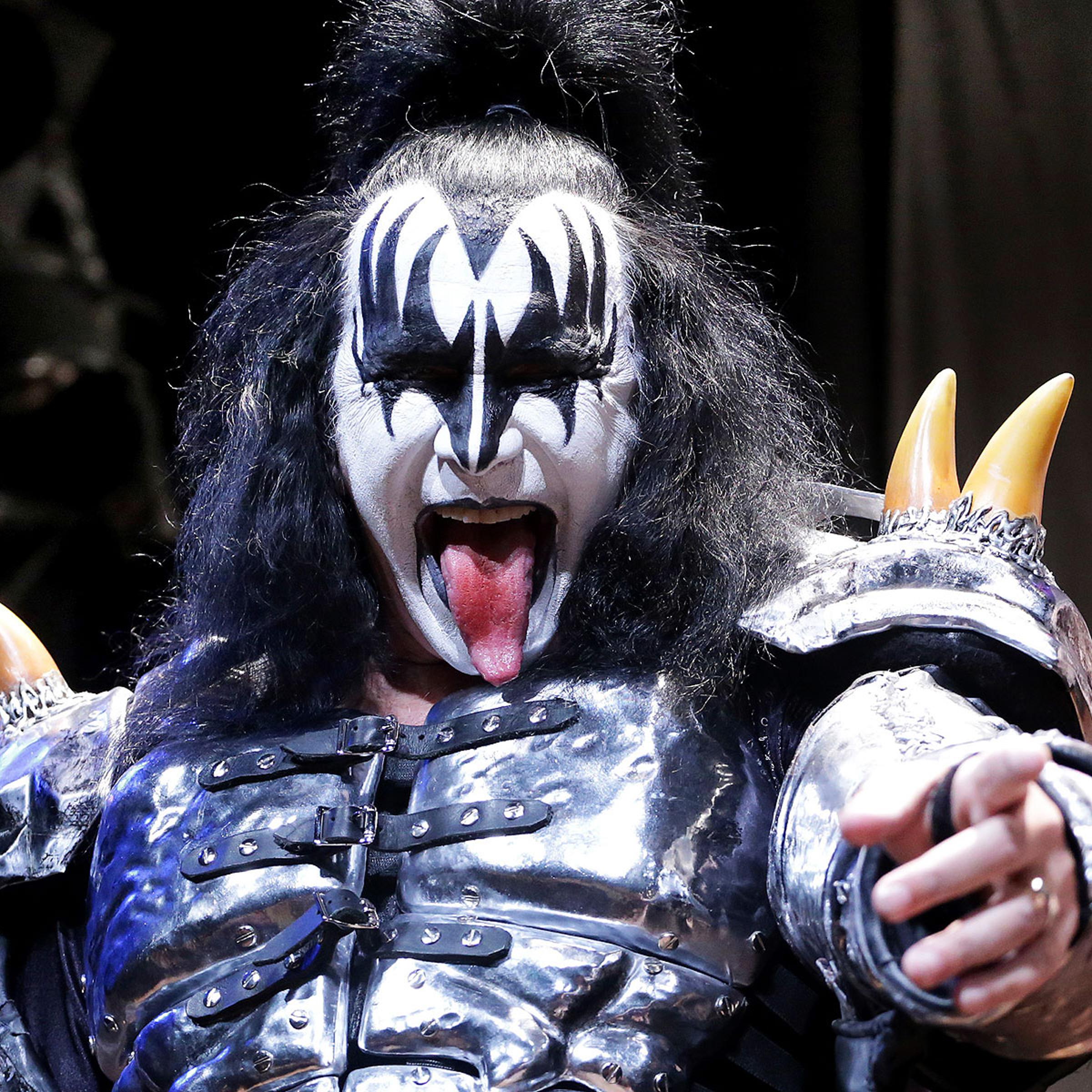 Gene Simmons, a member of the rock band Kiss, poses during an announcement that Kiss and Def Leppard will team up this summer for a 42-city North American tour, at the House of Blues in West Hollywood, California March 17, 2014