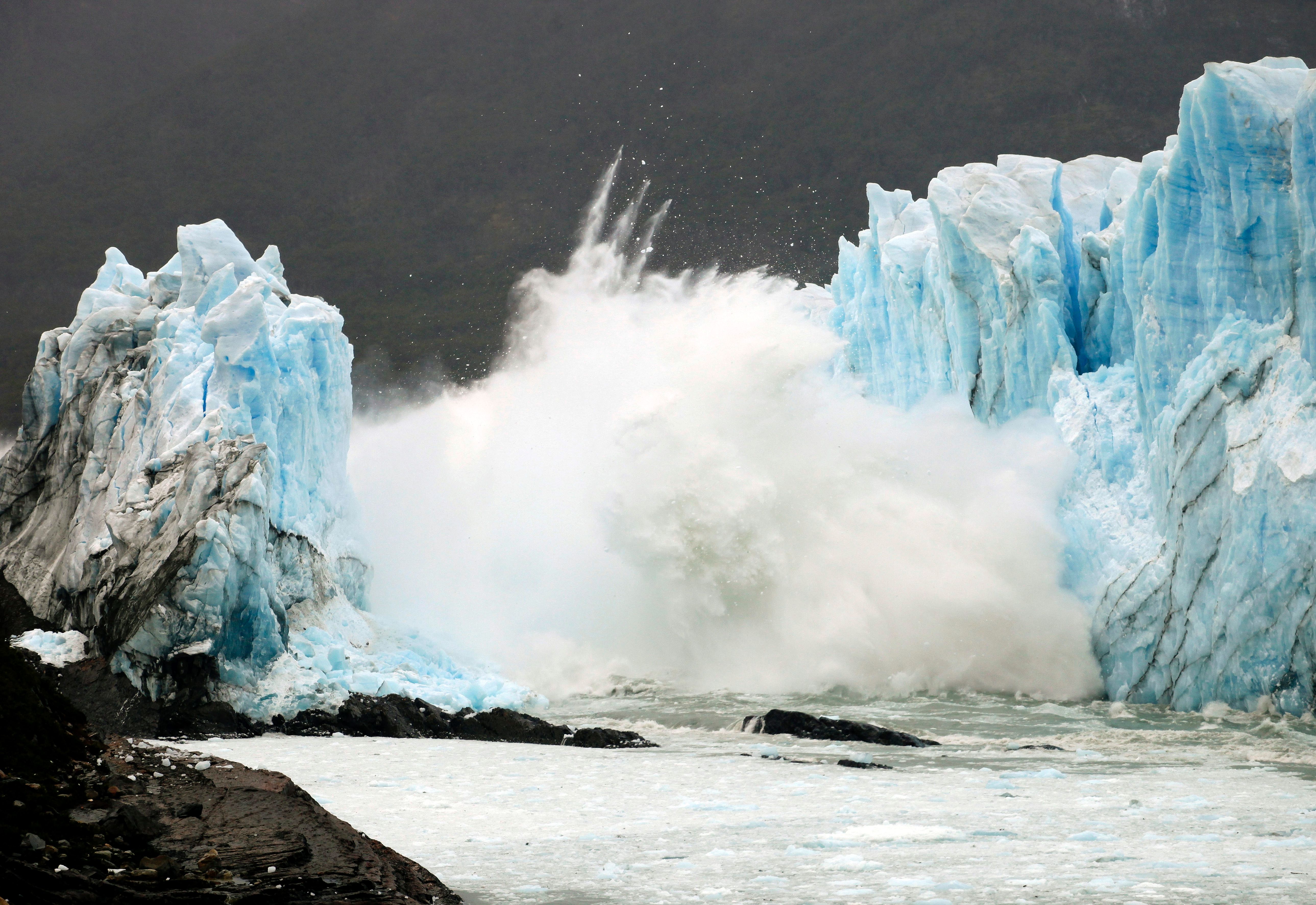An ice bridge cracks from the wall of the Perito Moreno Glacier located at Los Glaciares National Park, southwest Santa Cruz Province, Argentina, on March 10, 2016.