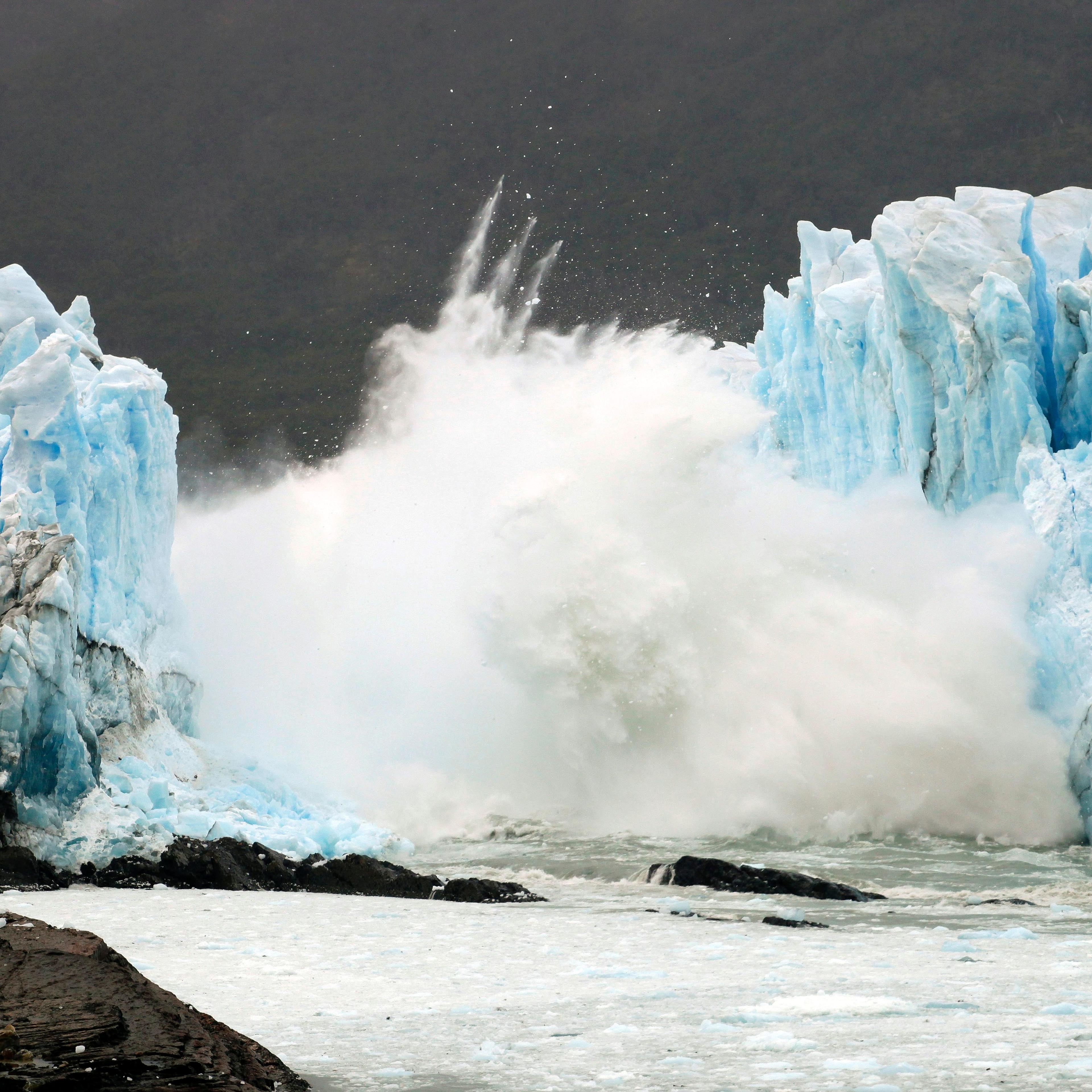 An ice bridge cracks from the wall of the Perito Moreno Glacier located at Los Glaciares National Park, southwest Santa Cruz Province, Argentina, on March 10, 2016.