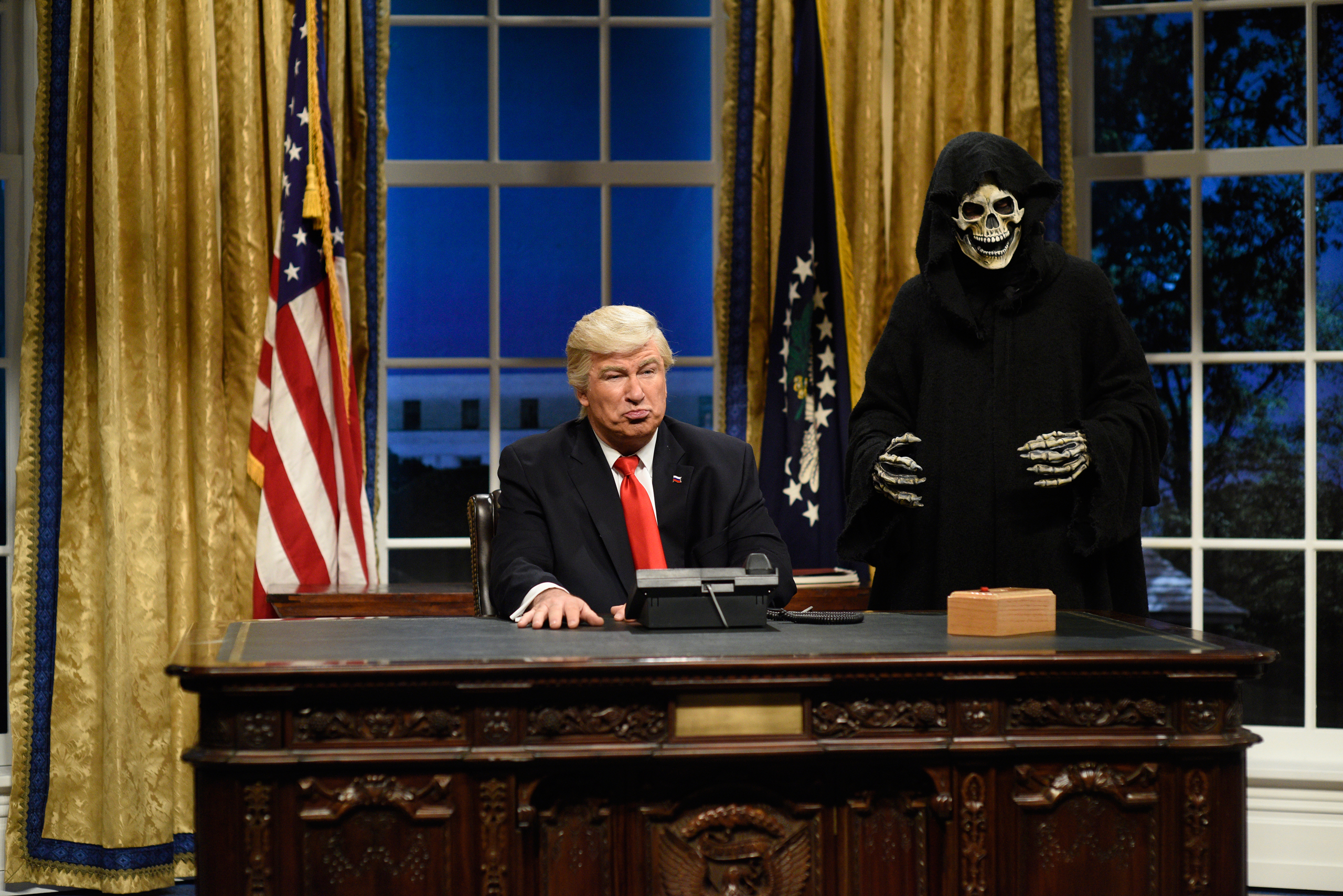 SATURDAY NIGHT LIVE -- "Kristen Stewart" Episode 1717 -- Pictured: (l-r) Alec Baldwin as President Donald J. Trump, Mikey Day as advisor Steve Bannon during the Oval Office Cold Open on February 4th, 2017 -- (Photo by: Will Heath/NBC/NBCU Photo Bank via 