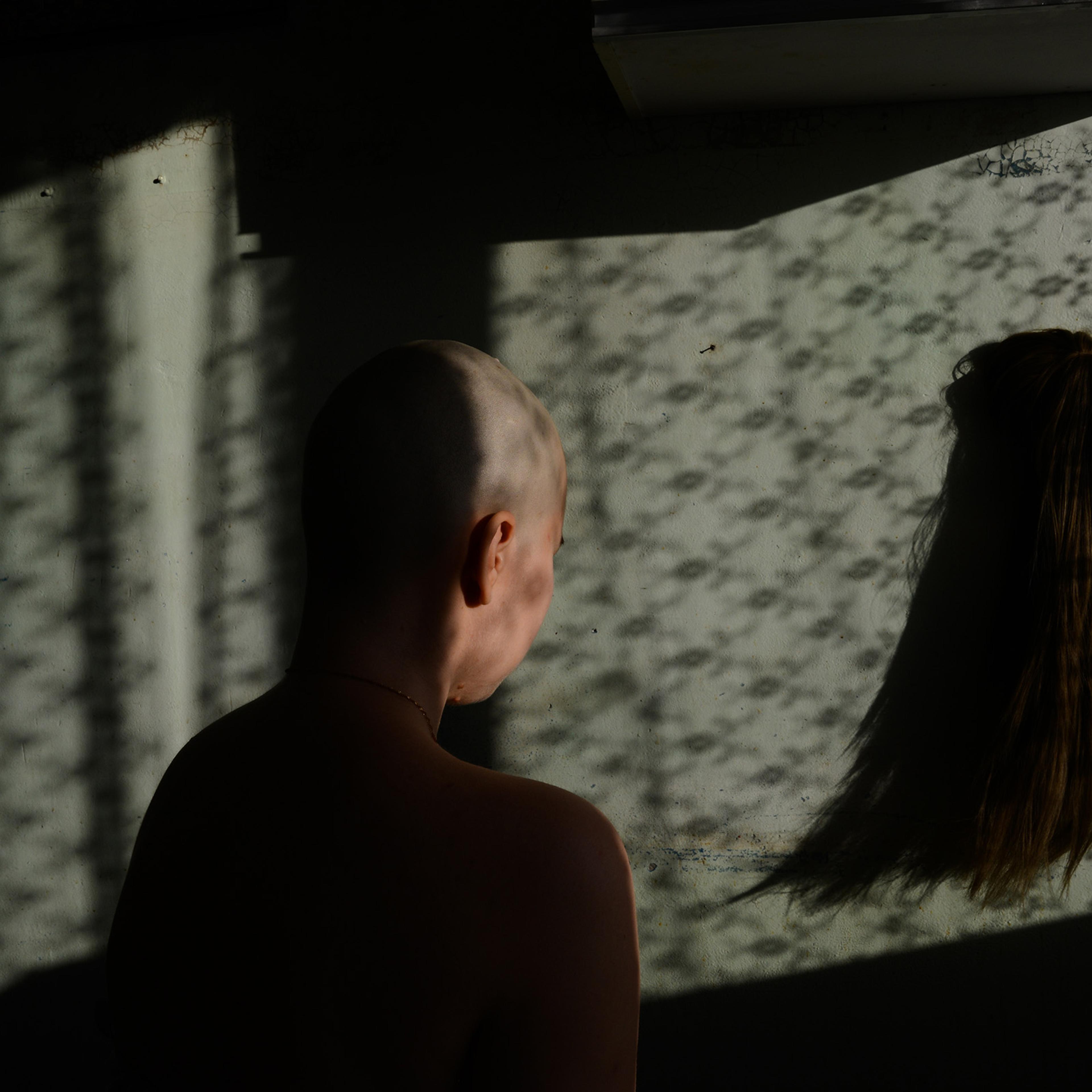 Me and my wig, which I used to wear during treatment.