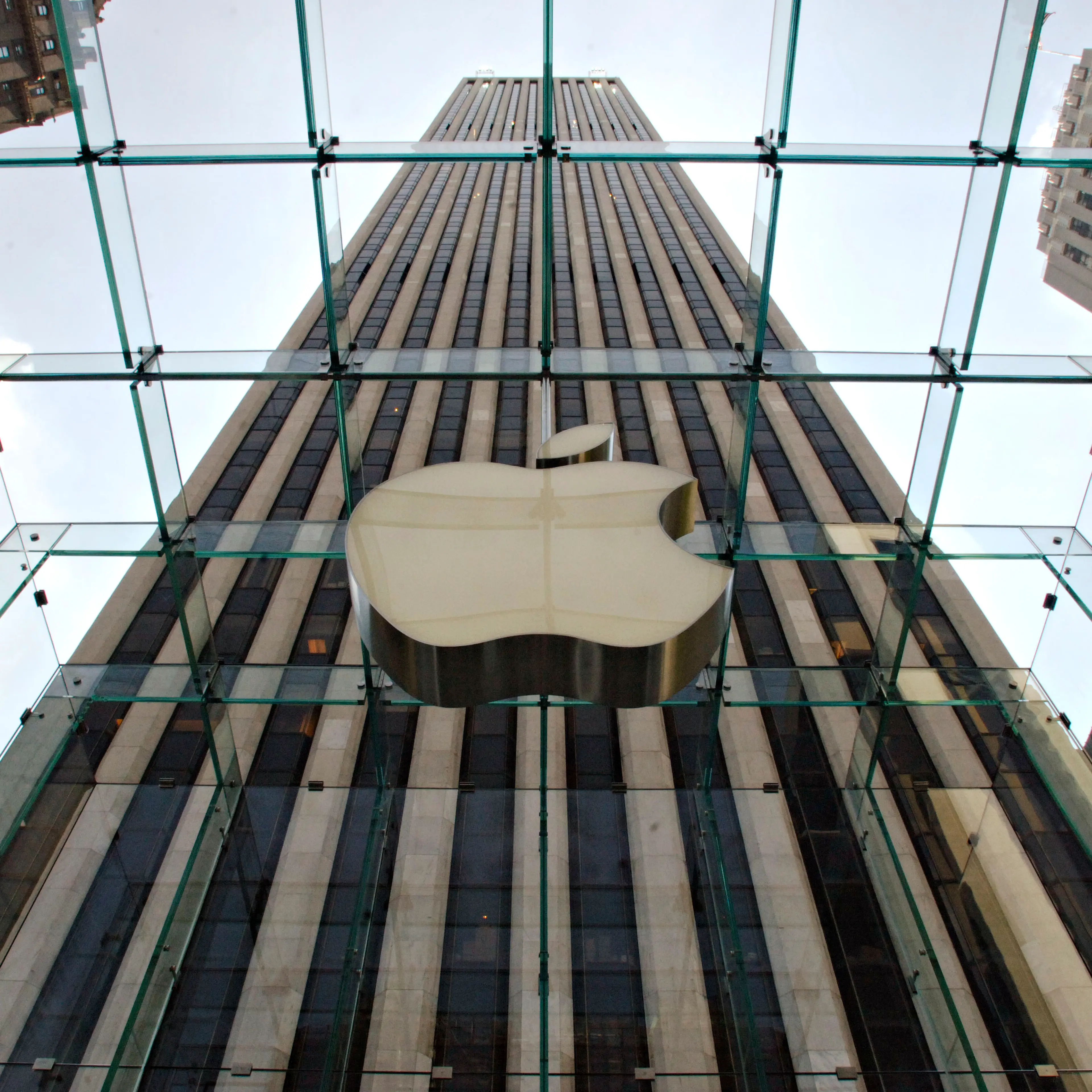An Apple Computer Inc. logo hangs in the center of a clear g